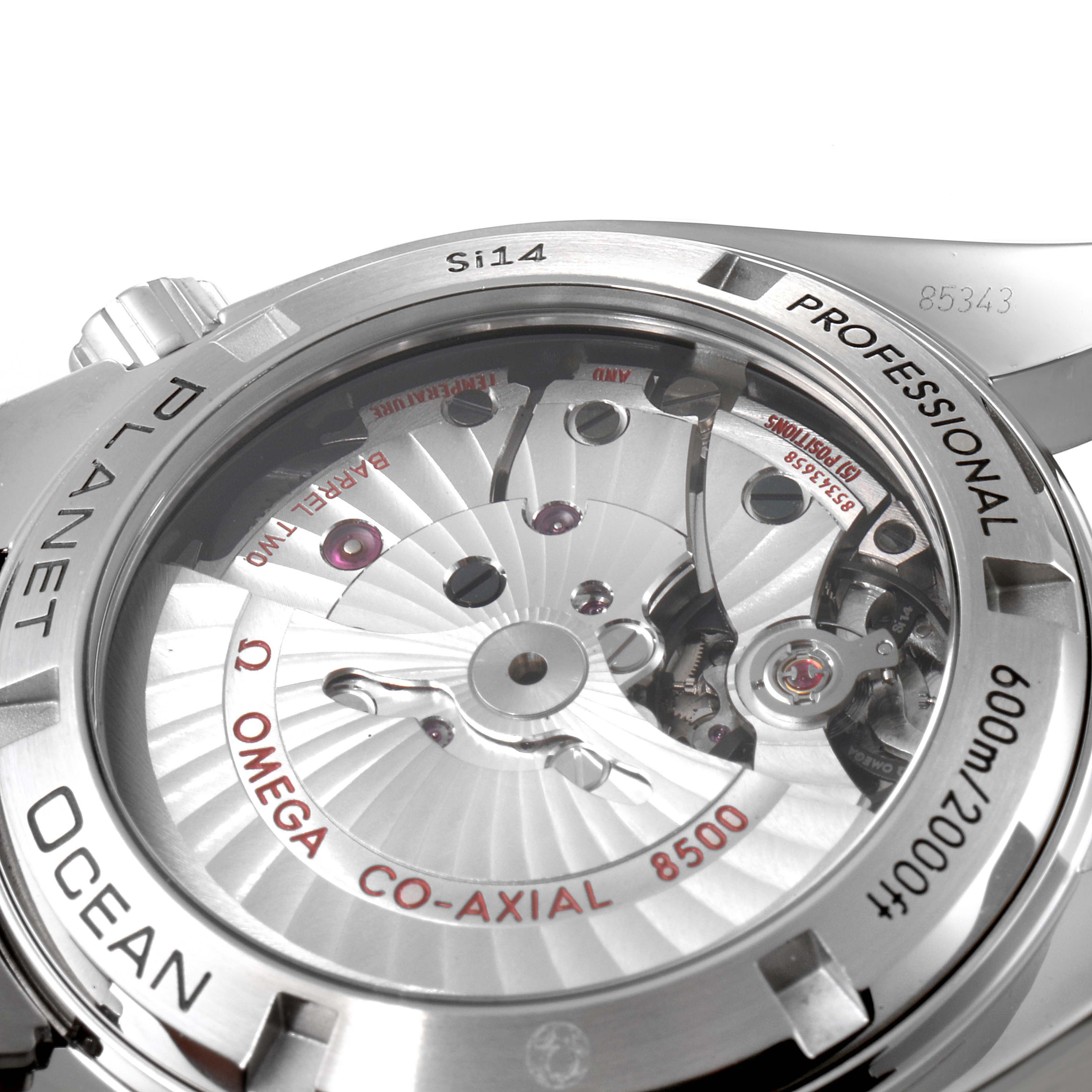 The image shows the back view of the Omega Planet Ocean 232.30.42.21.01.003 Men
s Stainless Steel Black Dial 232.30.42.21.01.003 Men
s Stainless Steel Black Dial watch, highlighting its exposed mechanical movement and Co-Axial 8500 mechanism.