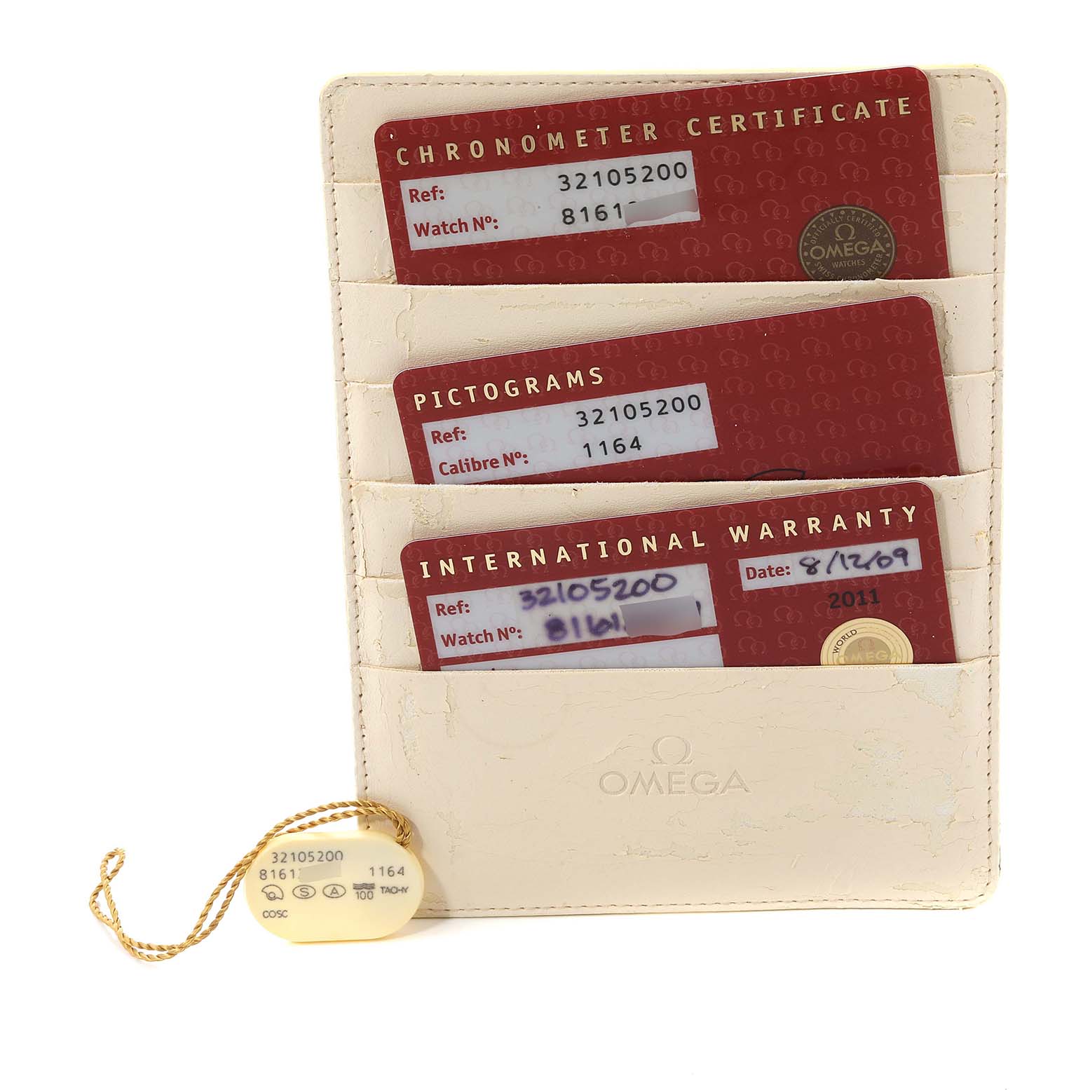 The image shows the official documentation and warranty cards for the Omega Speedmaster 3210.52.00 Men
s Stainless Steel Black Dial 3210.52.00 Men
s Stainless Steel Black Dial model, including the chronometer certificate and pictograms.