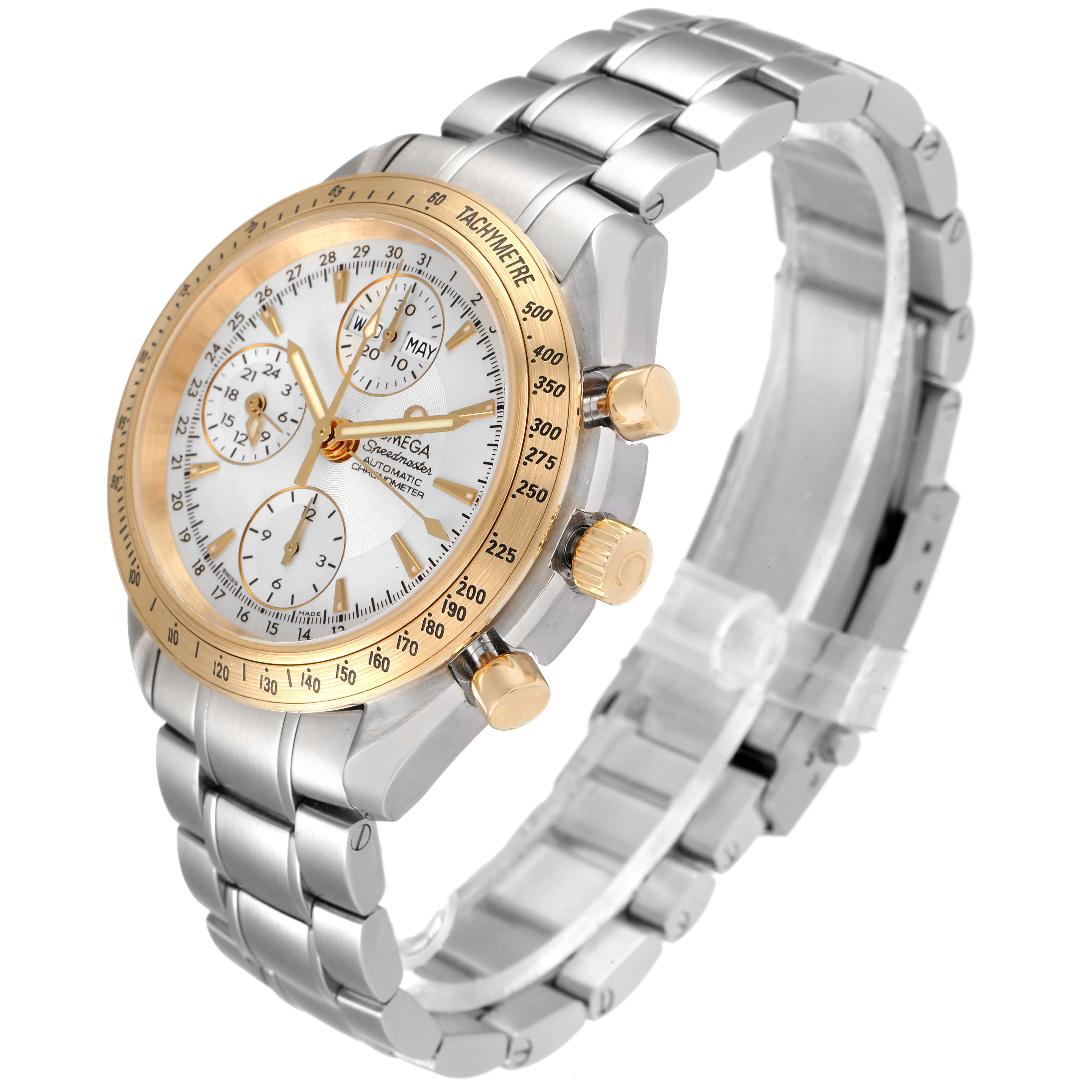 The image shows an Omega Speedmaster 323.21.40.44.02.001 Men's Steel and Gold (two tone) Silver Dial 323.21.40.44.02.001 Men's Steel and Gold (two tone) Silver Dial watch at a three-quarter angle, highlighting the face, bezel, and bracelet.