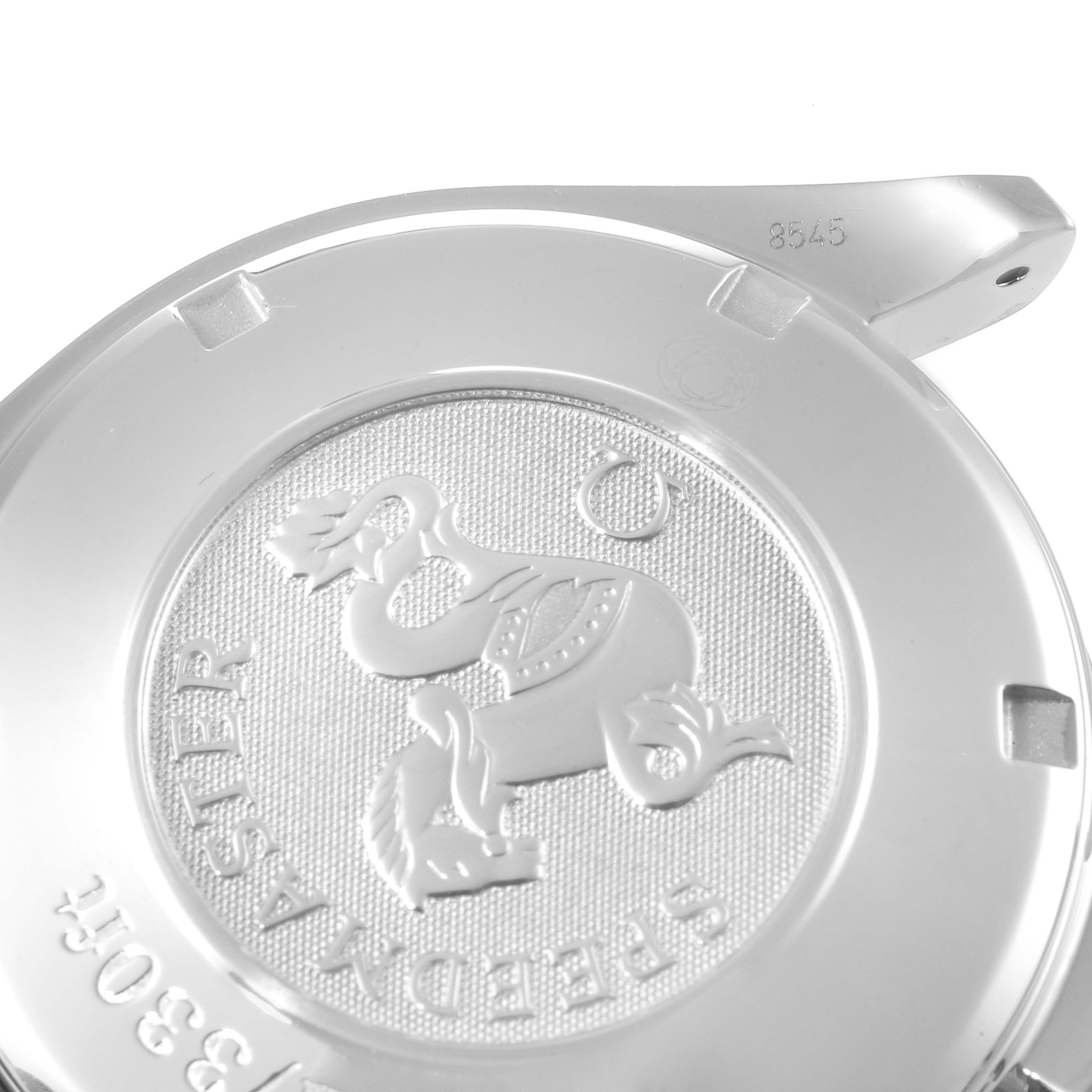 The image shows the back case of an Omega Speedmaster 323.21.40.44.02.001 Men's Steel and Gold (two tone) Silver Dial 323.21.40.44.02.001 Men's Steel and Gold (two tone) Silver Dial watch, featuring the embossed emblem and model name.