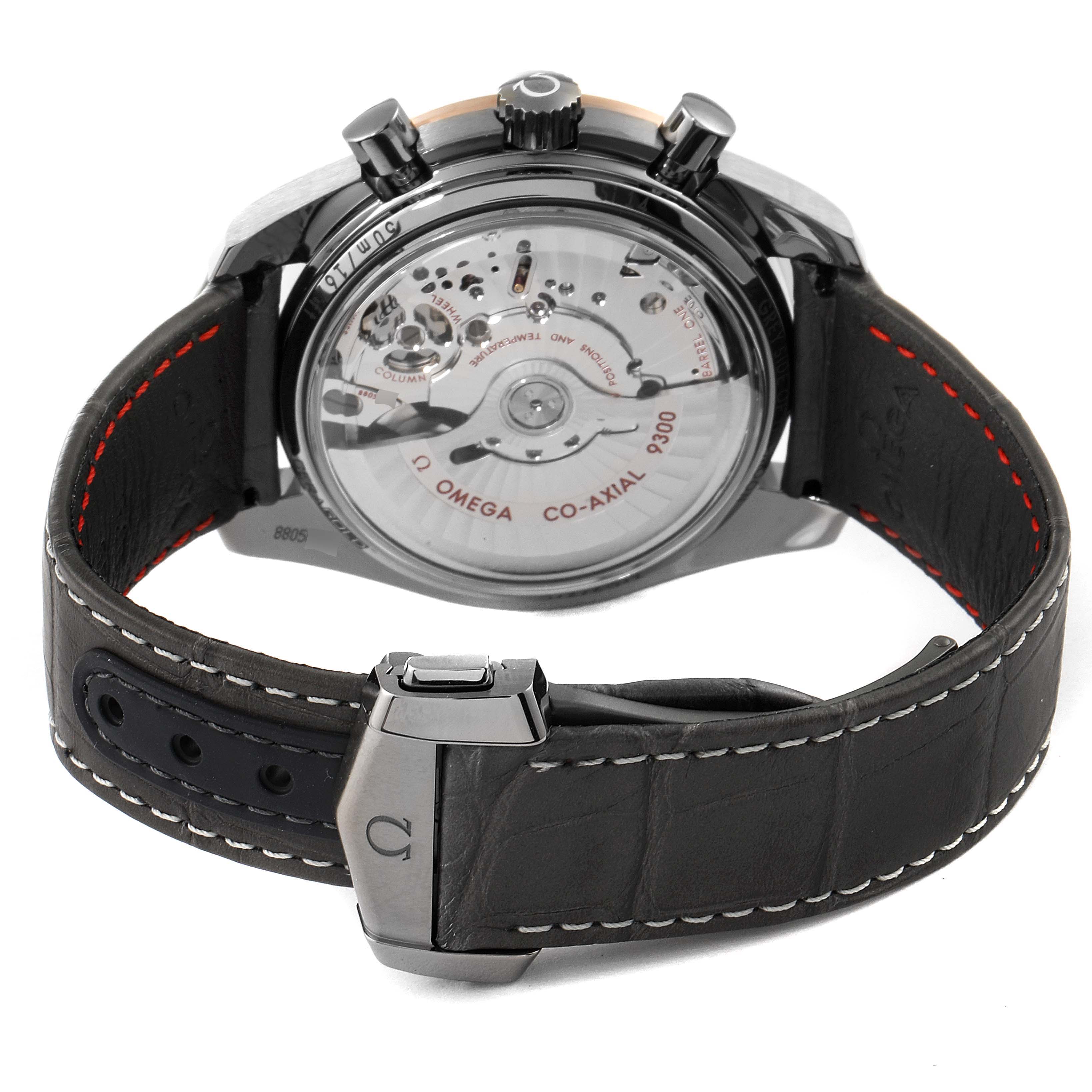 The image shows the back view of the Omega Speedmaster 311.63.44.51.99.001 Men's Ceramic Grey Dial 311.63.44.51.99.001 Men's Ceramic Grey Dial watch, highlighting its transparent case back and leather strap.