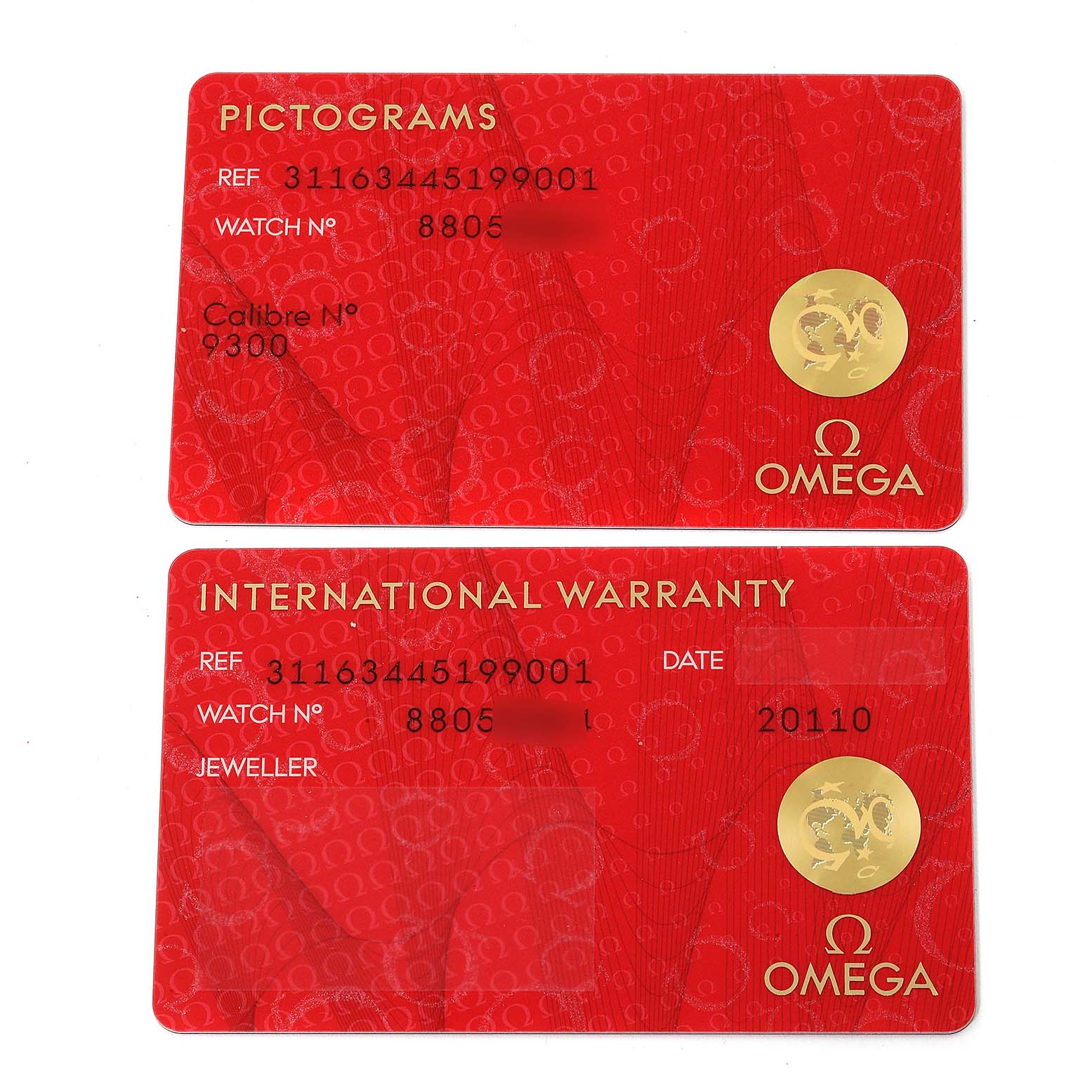 Two Omega Speedmaster 311.63.44.51.99.001 Men's Ceramic Grey Dial 311.63.44.51.99.001 Men's Ceramic Grey Dial cards are shown: a "Pictograms" card and an "International Warranty" card.