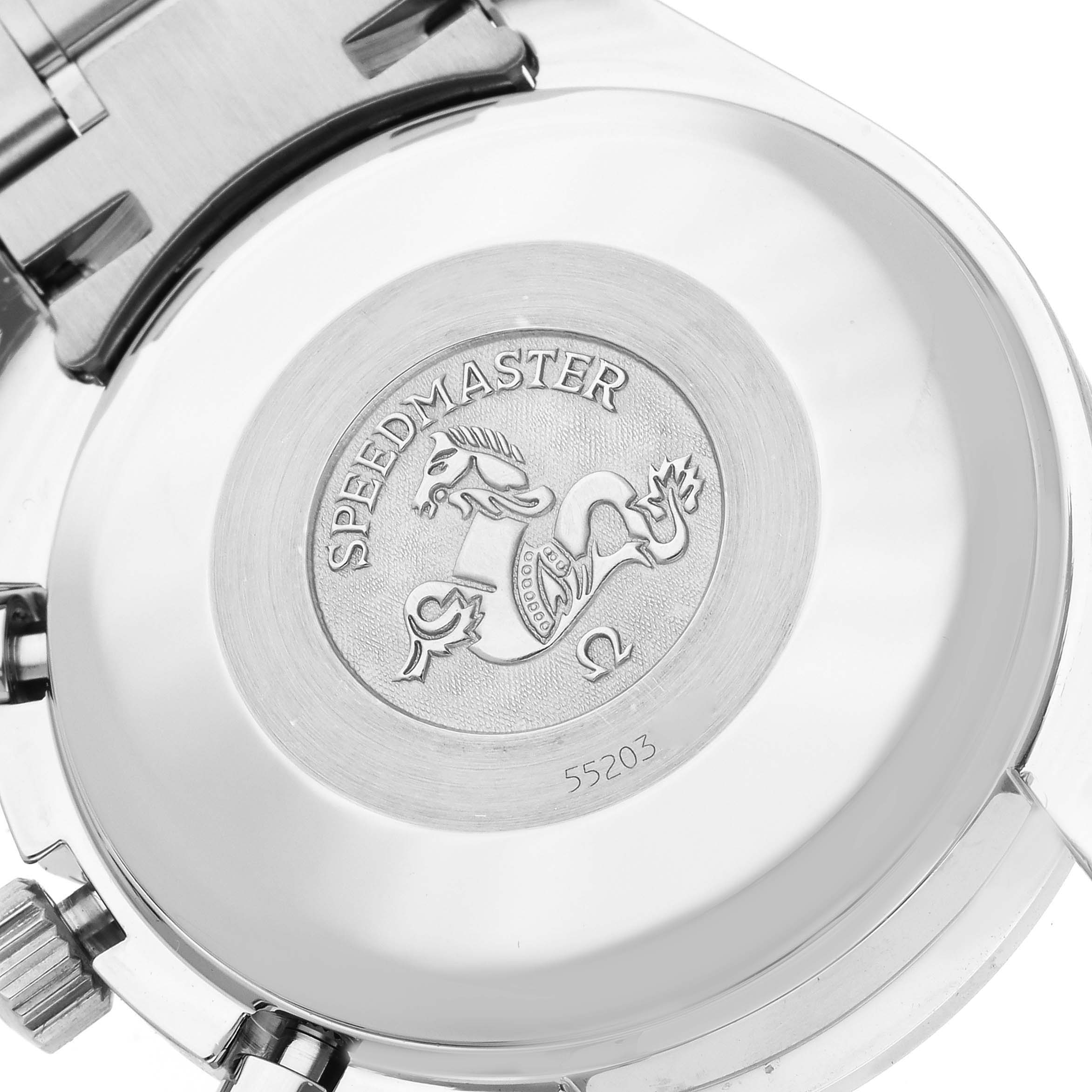 The image shows the back case of an Omega Speedmaster 3513.33.00 Men's Stainless Steel Silver Dial 3513.33.00 Men's Stainless Steel Silver Dial watch, highlighting its logo and engraving.