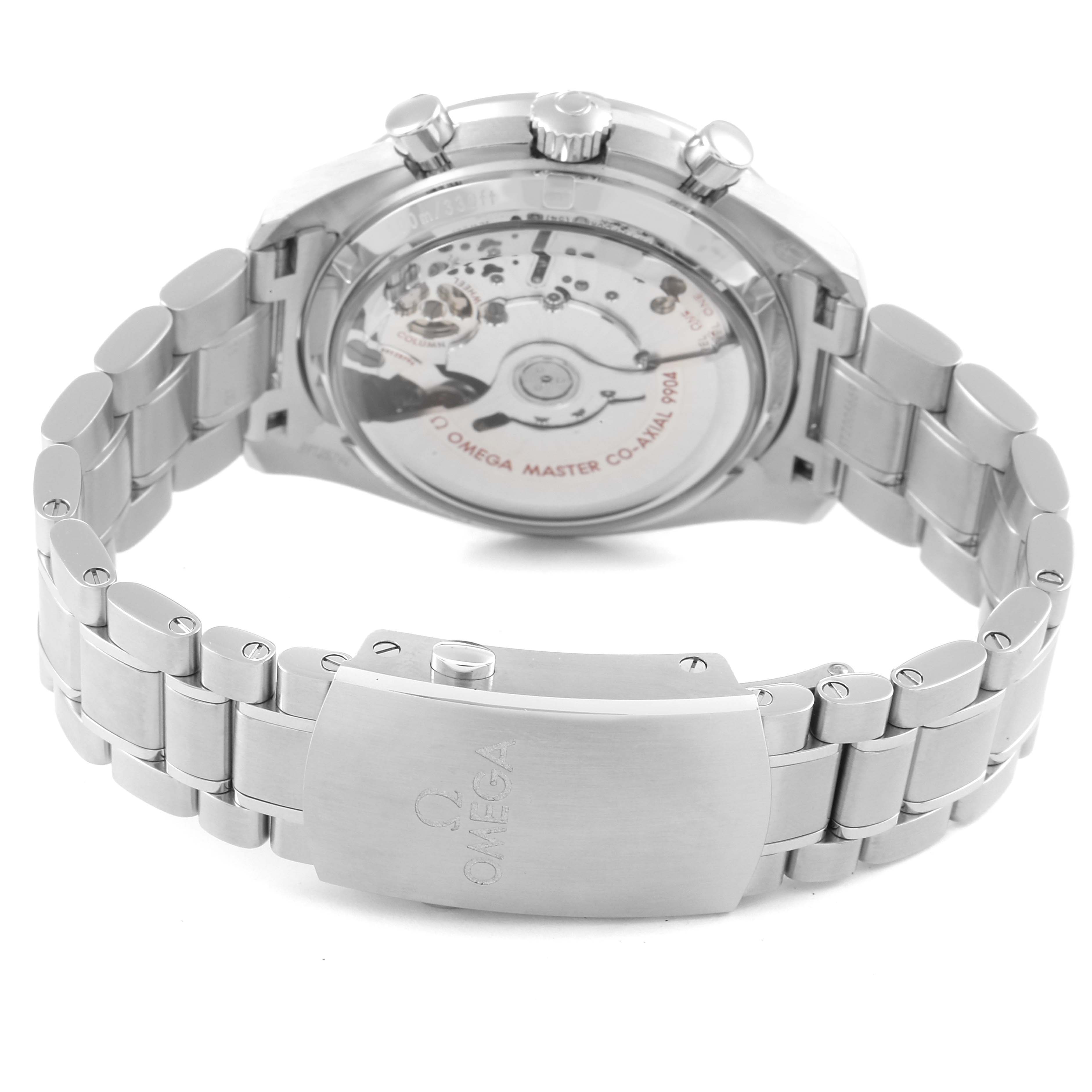 The Omega Speedmaster 304.30.44.52.01.001 Men's Stainless Steel Black Dial 304.30.44.52.01.001 Men's Stainless Steel Black Dial watch is shown from the back, showcasing its open caseback and metal bracelet with an engraved clasp.