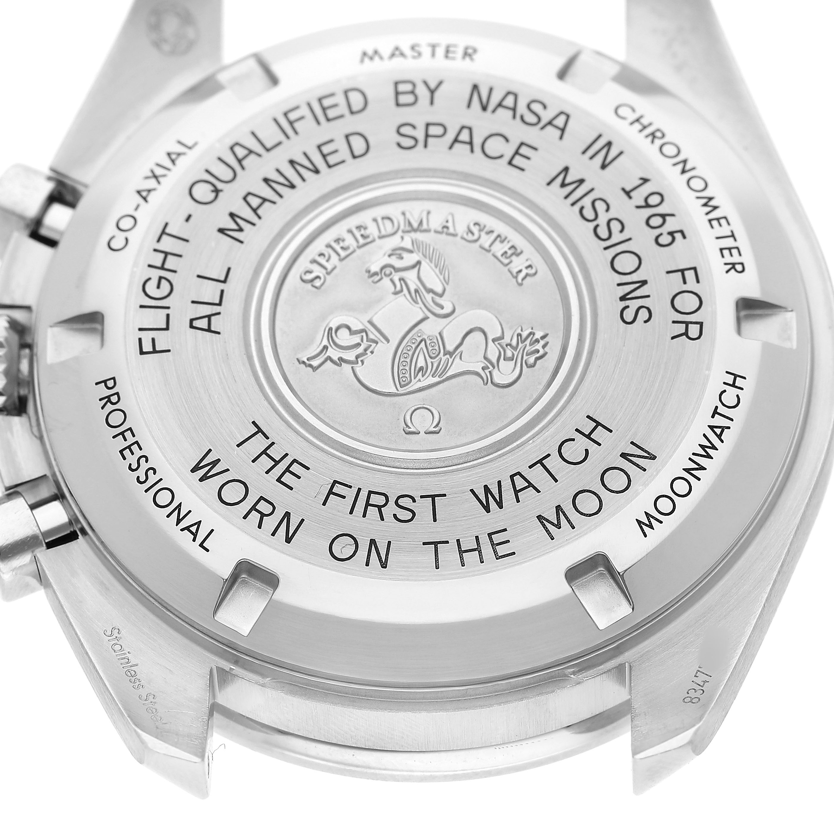 The image shows the case back of the Omega Speedmaster 310.30.42.50.01.001 Men's Stainless Steel Black Dial, highlighting engraved text and logos.
