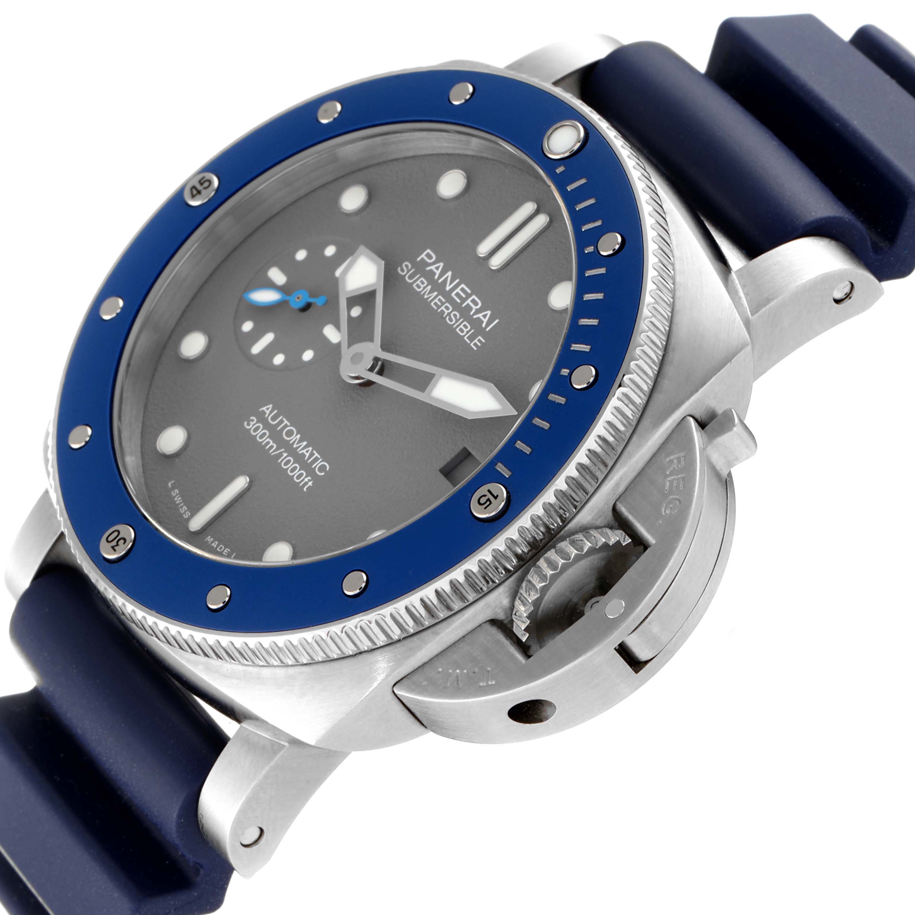 The Panerai Submersible PAM00959 Men's Stainless Steel Grey Dial PAM00959 Men's Stainless Steel Grey Dial watch is shown at an angle highlighting its dial, blue bezel, crown, and part of its strap.