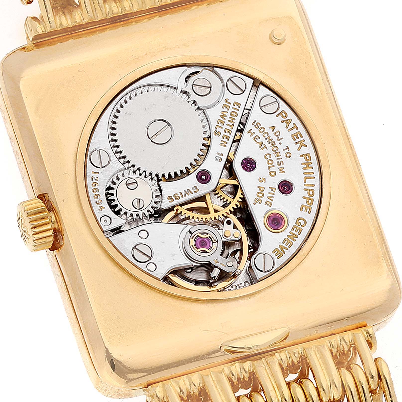 The image shows the exposed back view of the Patek Philippe Gondolo 4224 - 1 Women's Yellow Gold Brown Dial 4224 - 1 Women's Yellow Gold Brown Dial model, highlighting its intricate mechanical movement.