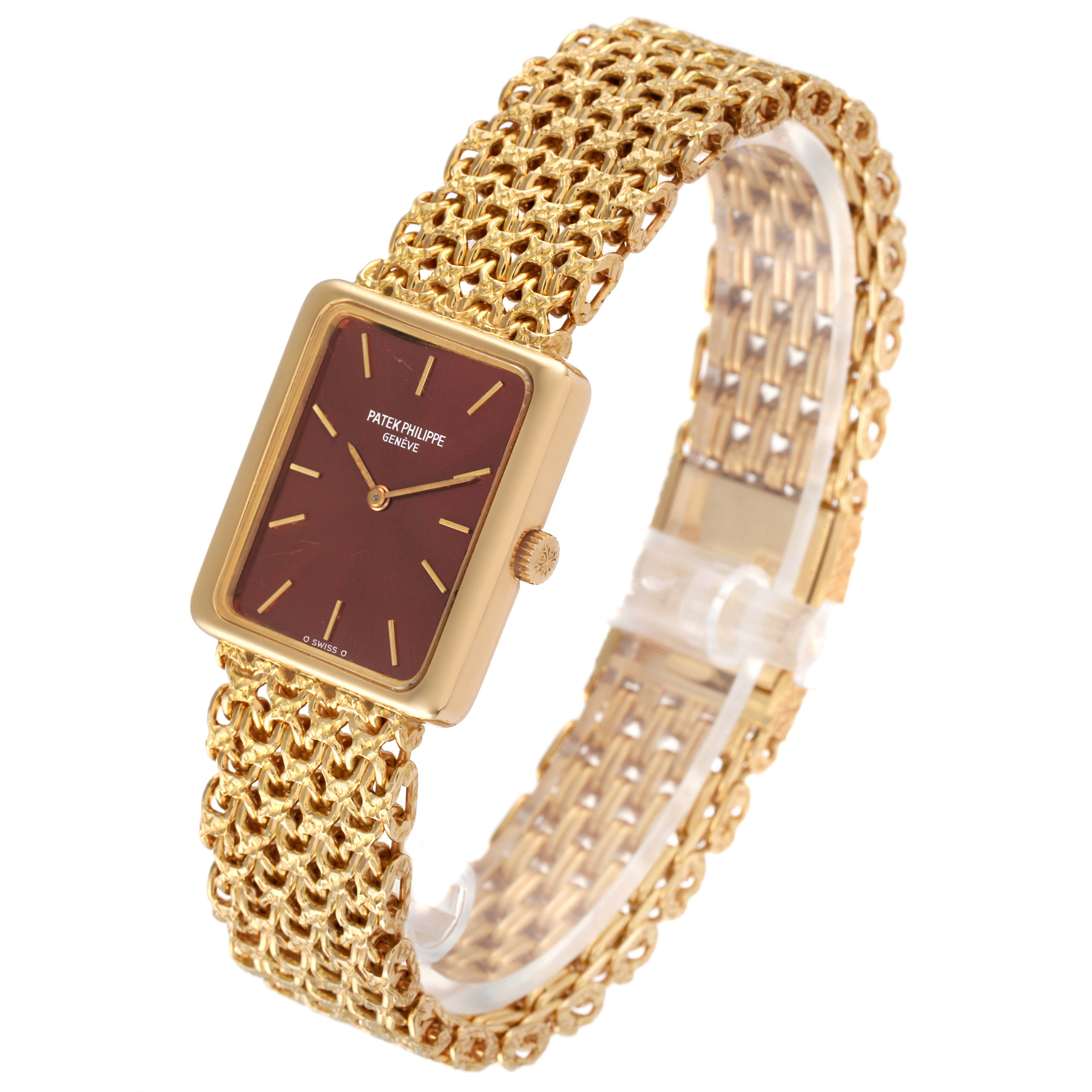 The image shows a Patek Philippe Gondolo 4224 - 1 Women's Yellow Gold Brown Dial 4224 - 1 Women's Yellow Gold Brown Dial watch from an angled view, displaying its square face, gold case, and woven gold strap.