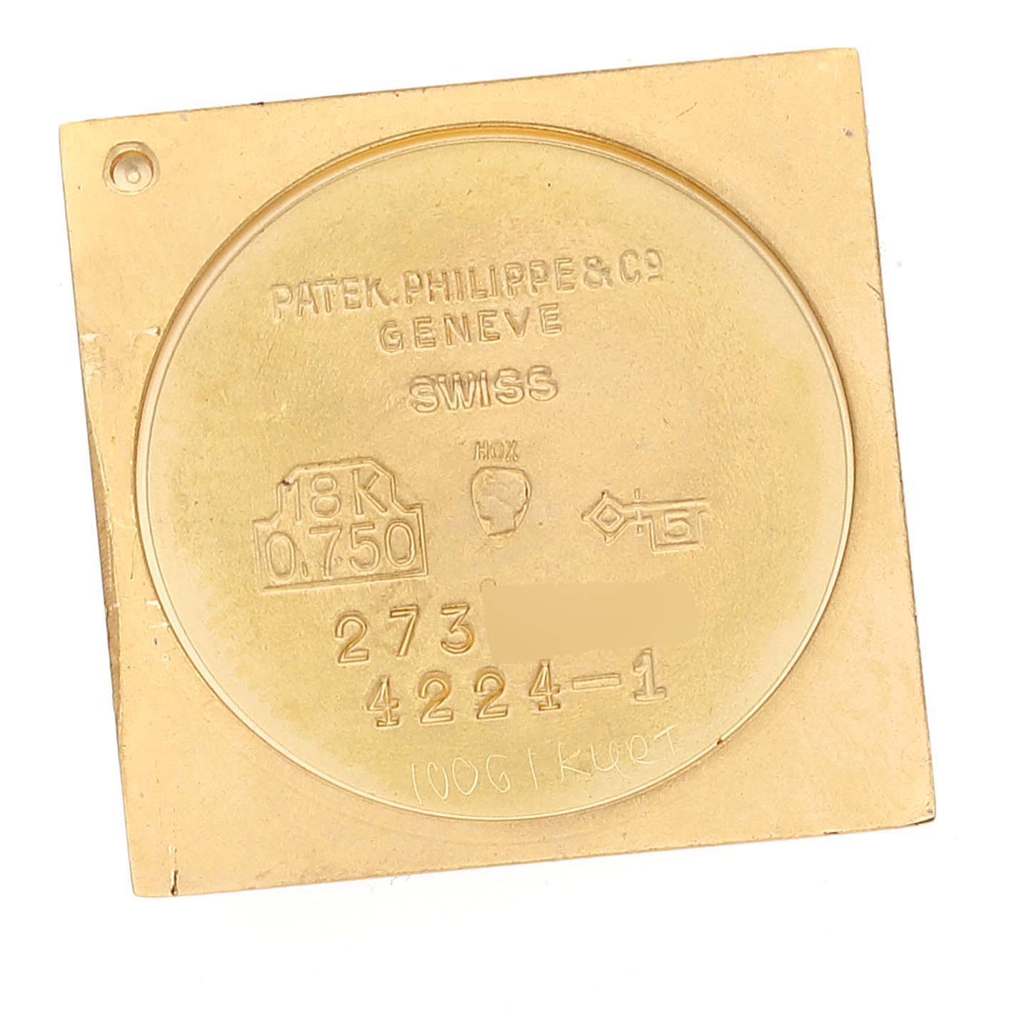 This image shows the inner case back of a Patek Philippe Gondolo 4224 - 1 Women's Yellow Gold Brown Dial 4224 - 1 Women's Yellow Gold Brown Dial model watch, including engravings and hallmarks.