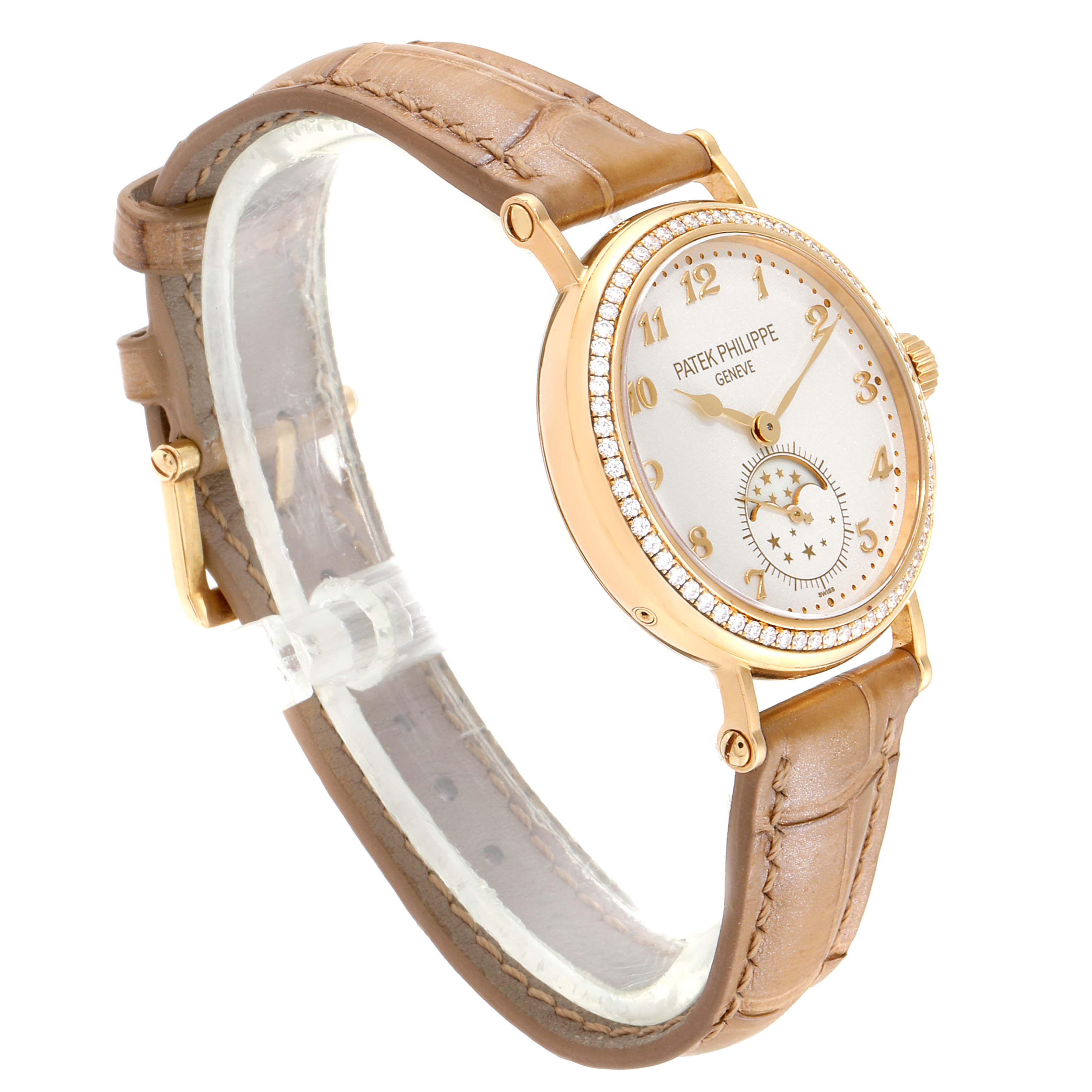 The image shows a side angle of a Patek Philippe Calatrava 7121J-001 Women's Yellow Gold Silver Dial 7121J-001 Women's Yellow Gold Silver Dial watch featuring a leather strap and diamond-set bezel.