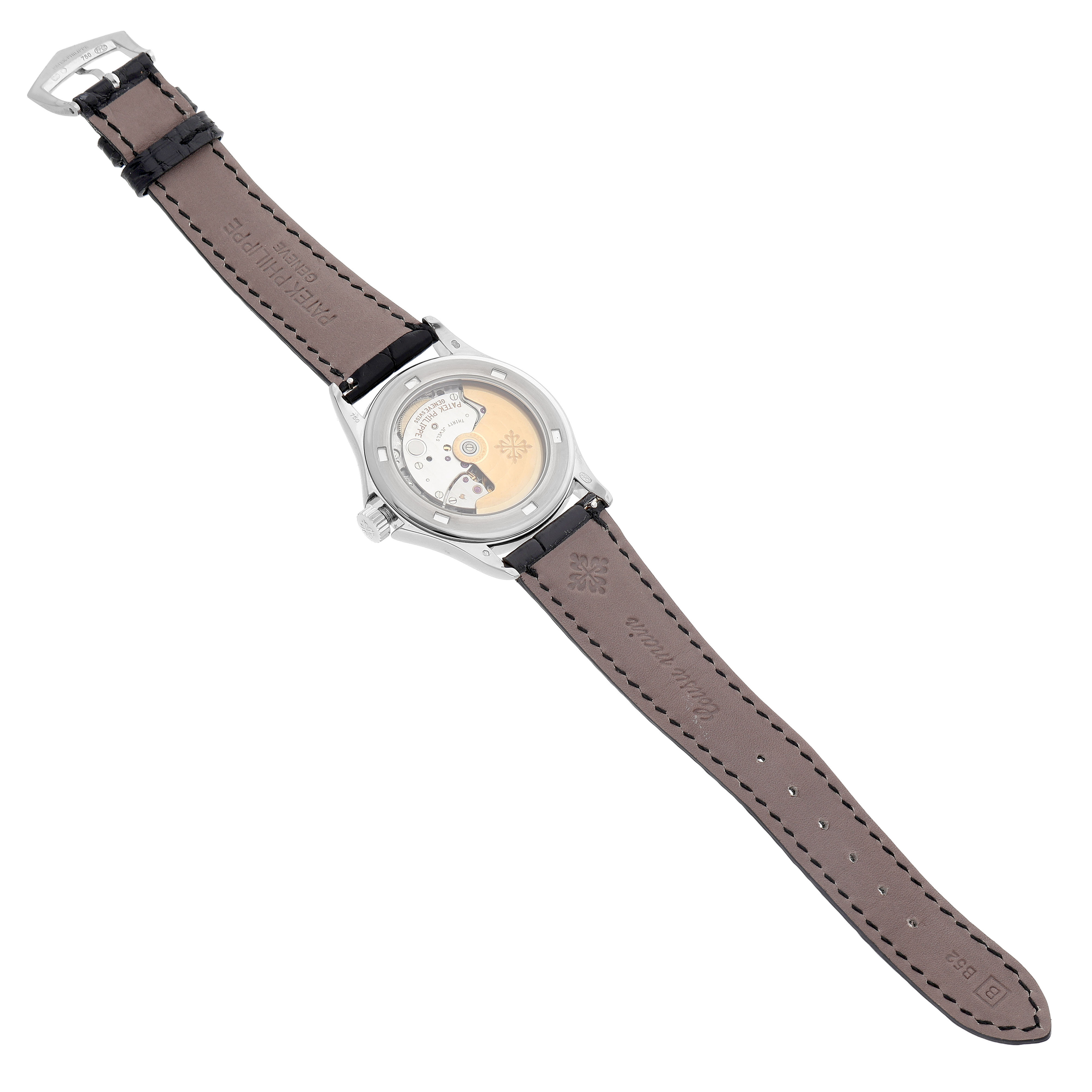 The image shows the back view of a Patek Philippe Calatrava 5107G Men's White Gold Silver Dial, displaying its movement and leather strap.