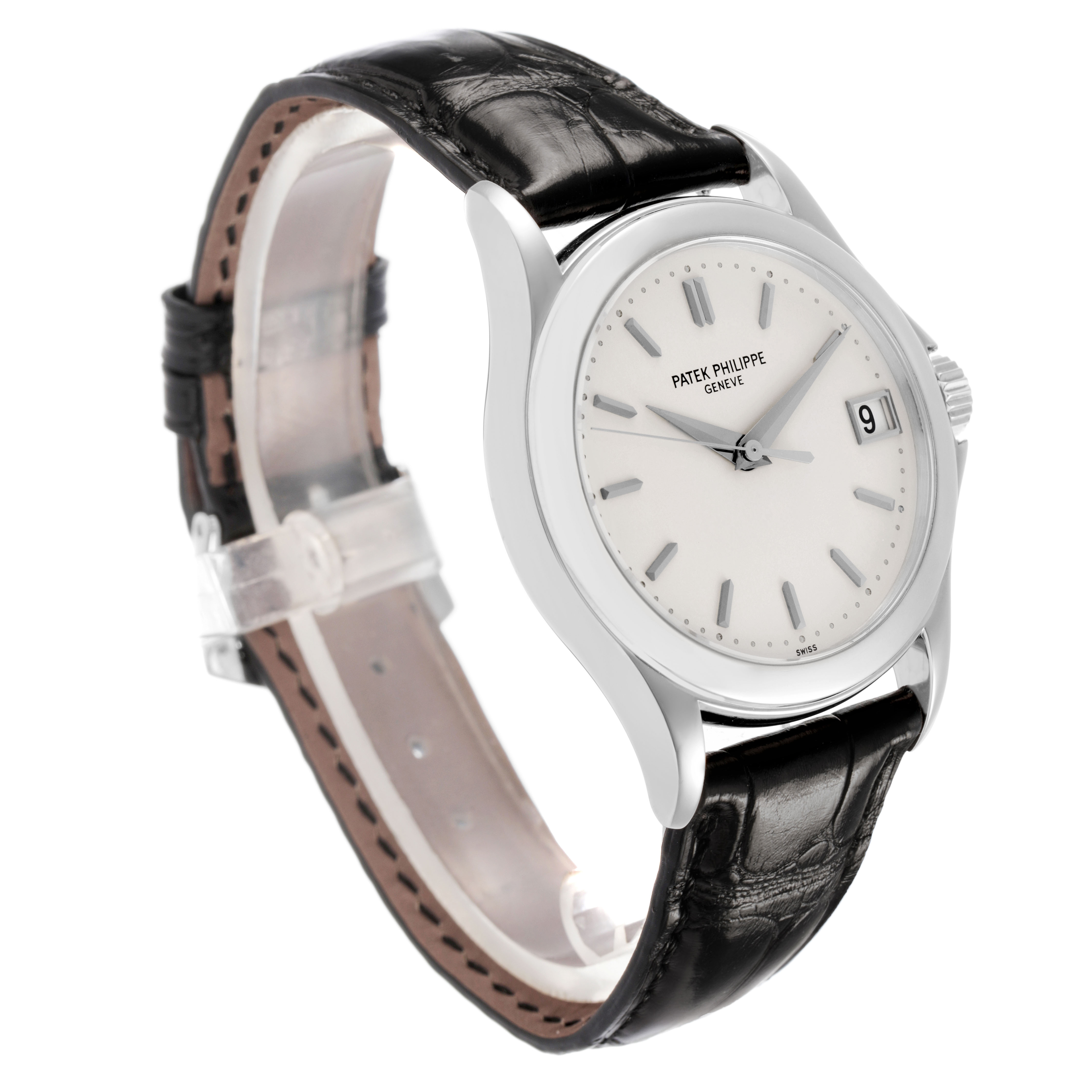 The Patek Philippe Calatrava 5107G Men's White Gold Silver Dial watch is shown at a three-quarter angle, highlighting the face, leather strap, and side of the case.