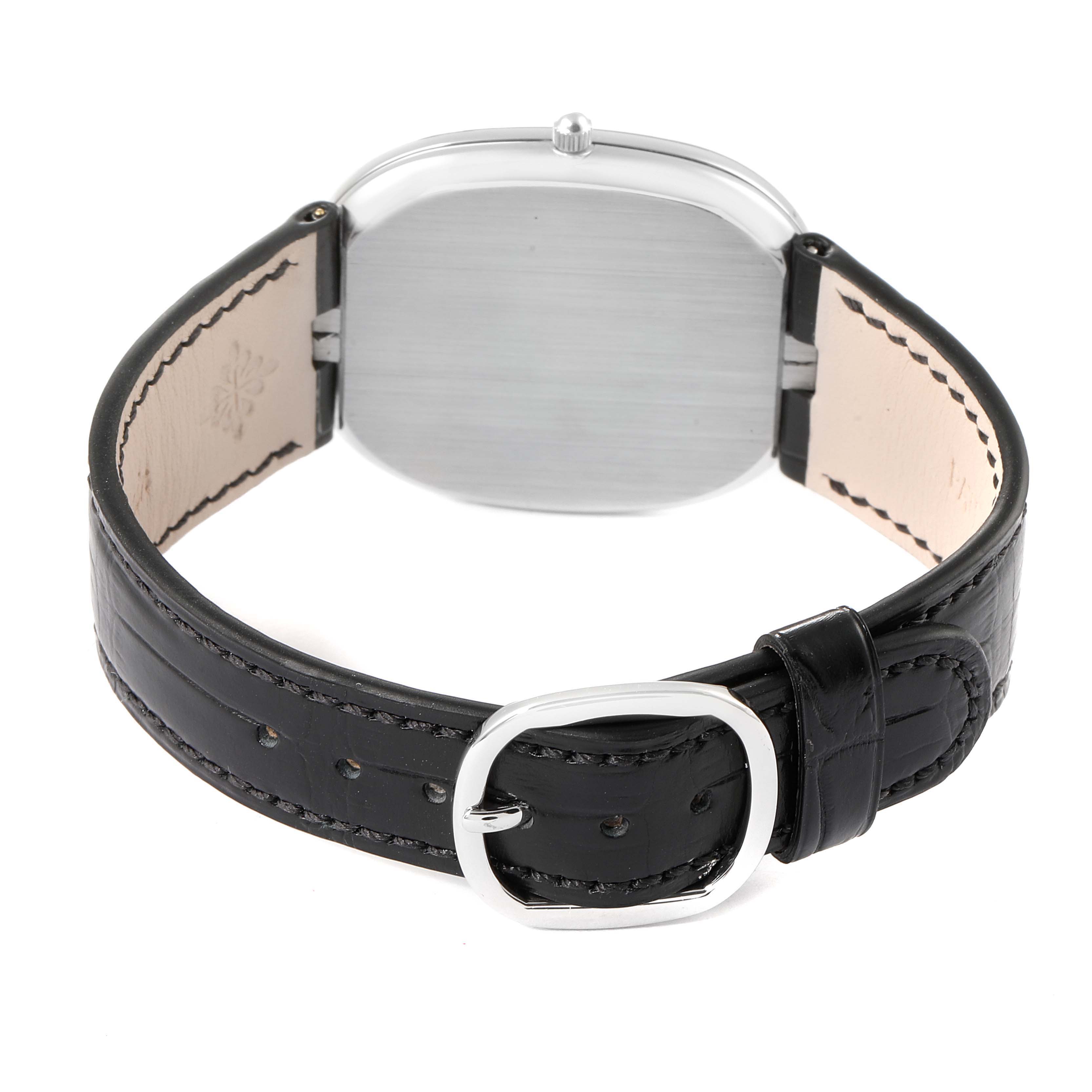 This image shows the back view of the Patek Philippe Golden Ellipse 5738P-001 Men's Platinum Blue Dial 5738P-001 Men's Platinum Blue Dial watch, highlighting its leather strap and buckle.