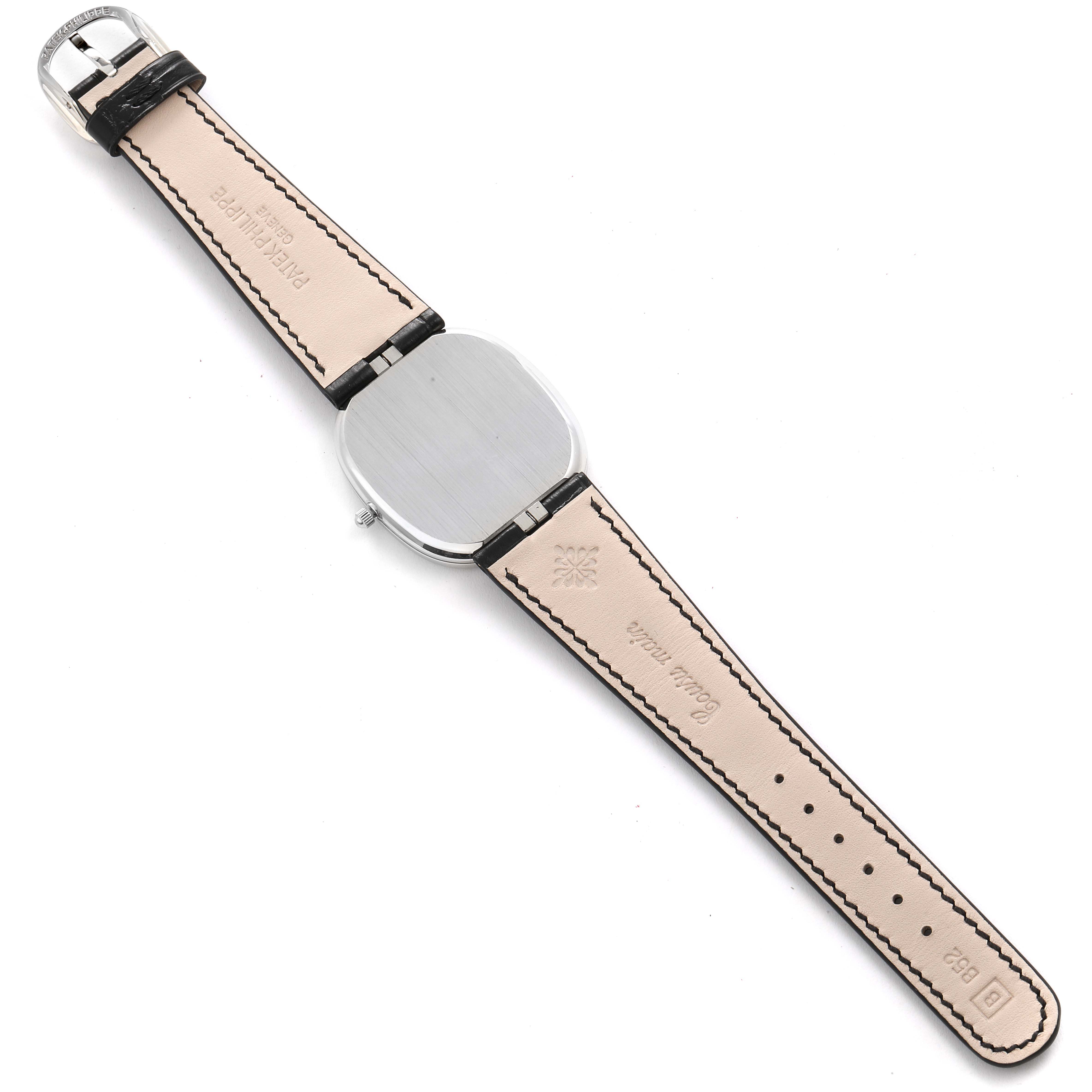 This image shows the back view of a Patek Philippe Golden Ellipse 5738P-001 Men's Platinum Blue Dial 5738P-001 Men's Platinum Blue Dial watch with its leather strap fully extended.