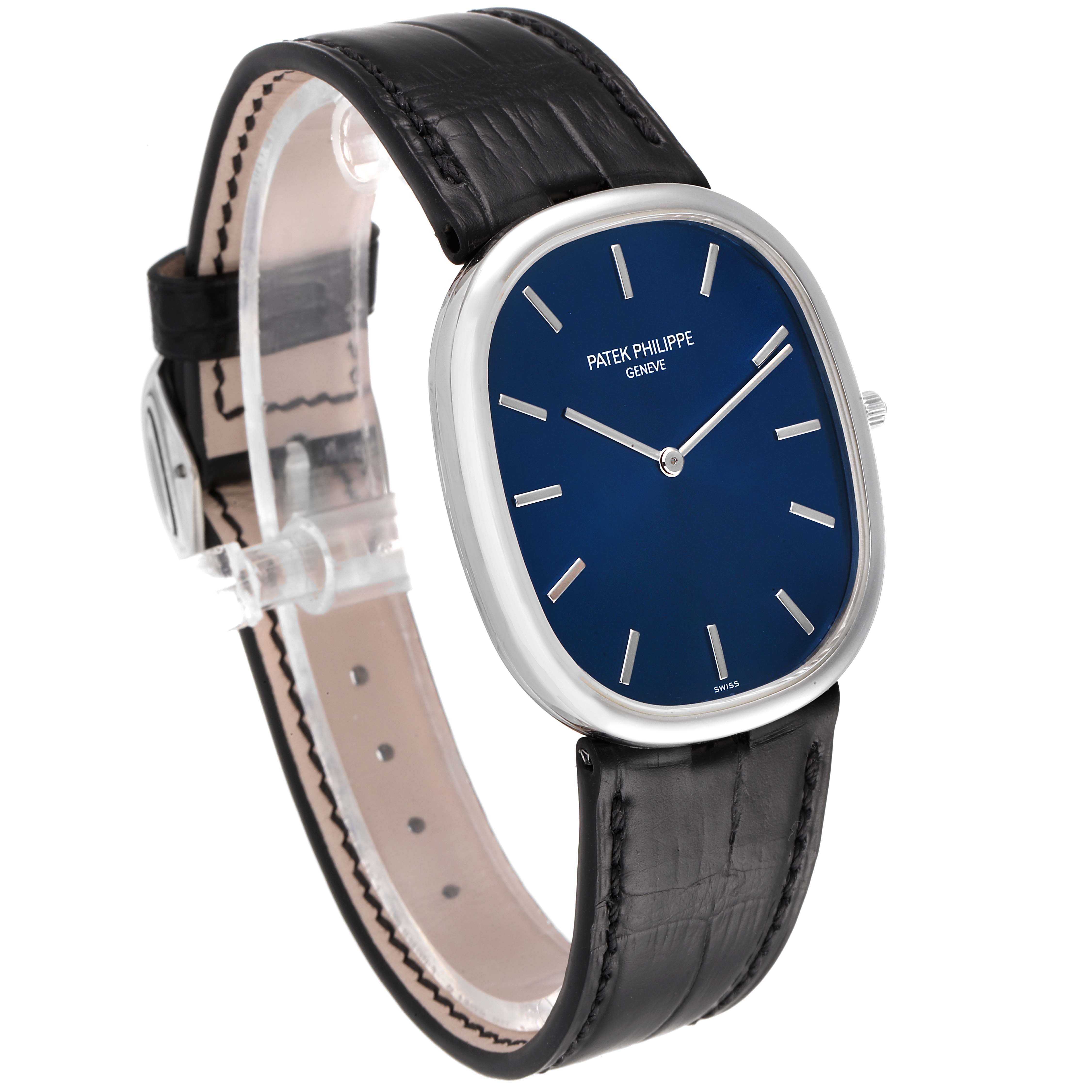 The image shows a Patek Philippe Golden Ellipse 5738P-001 Men's Platinum Blue Dial 5738P-001 Men's Platinum Blue Dial watch angled slightly from the left, highlighting the dial, case, and leather strap.