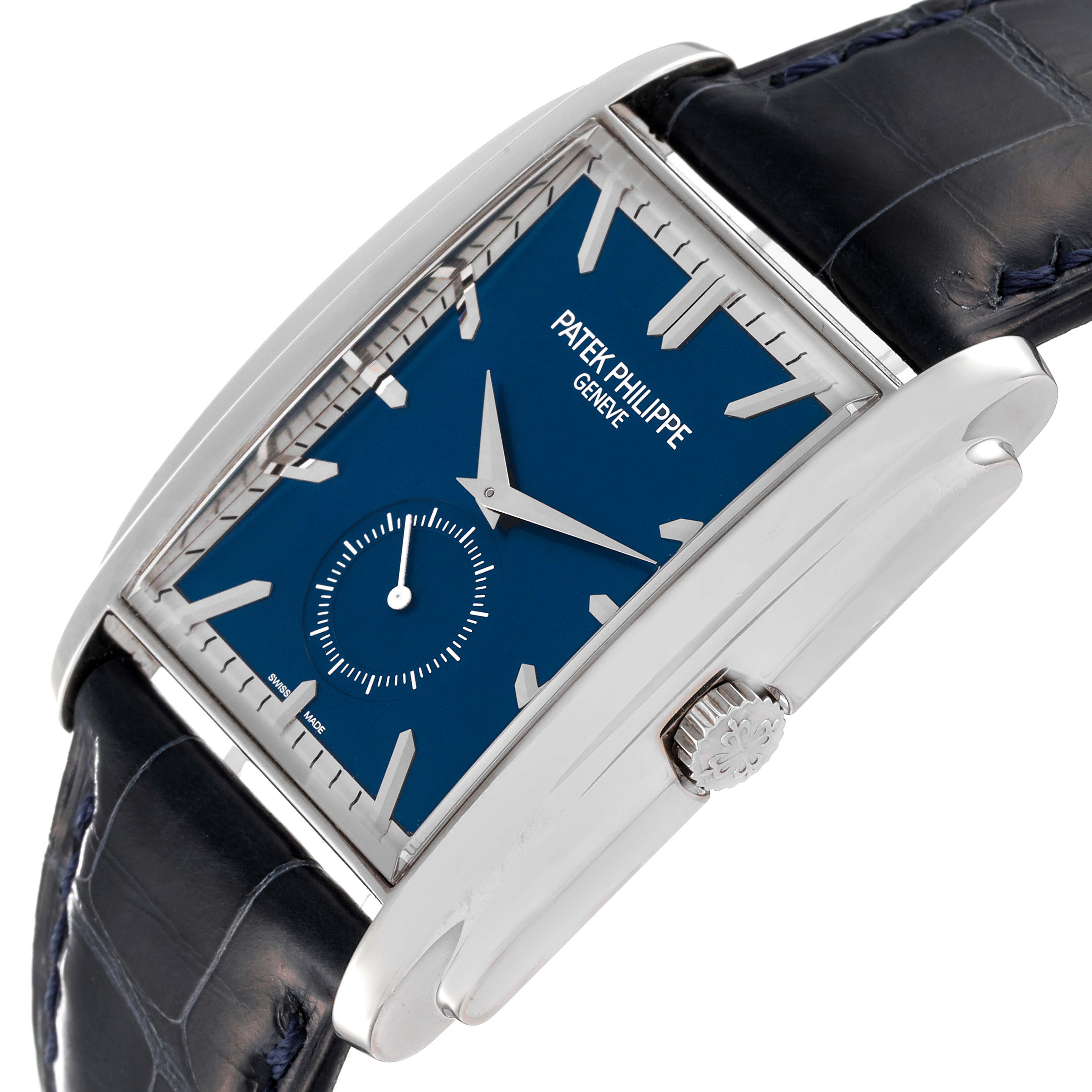 The Patek Philippe Gondolo 5124G Men's White Gold Blue Dial 5124G Men's White Gold Blue Dial watch is shown at an angle highlighting the dial, side crown, and strap attachment.