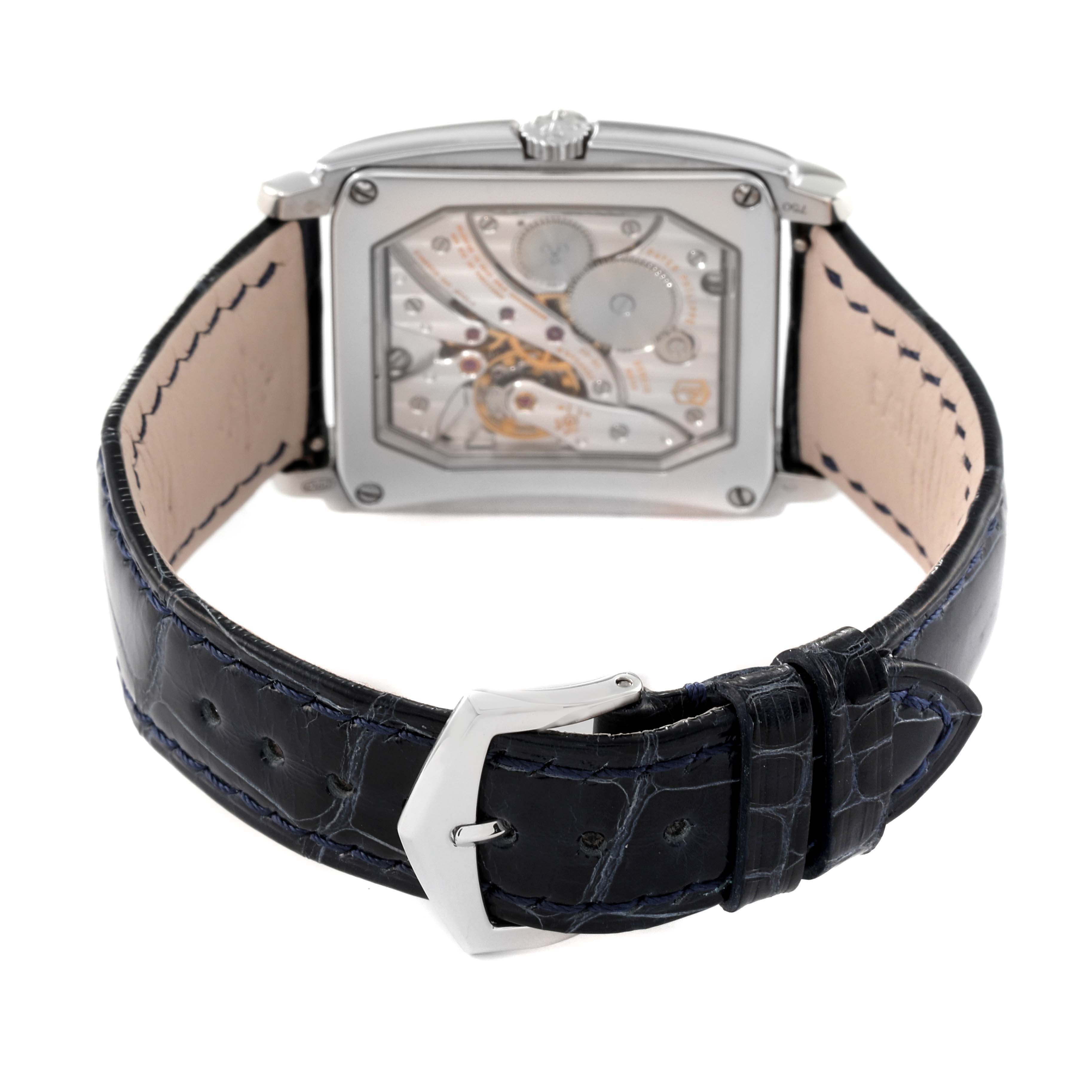 This image shows the back view of a Patek Philippe Gondolo 5124G Men's White Gold Blue Dial 5124G Men's White Gold Blue Dial watch, highlighting its movement and leather strap with a buckle.