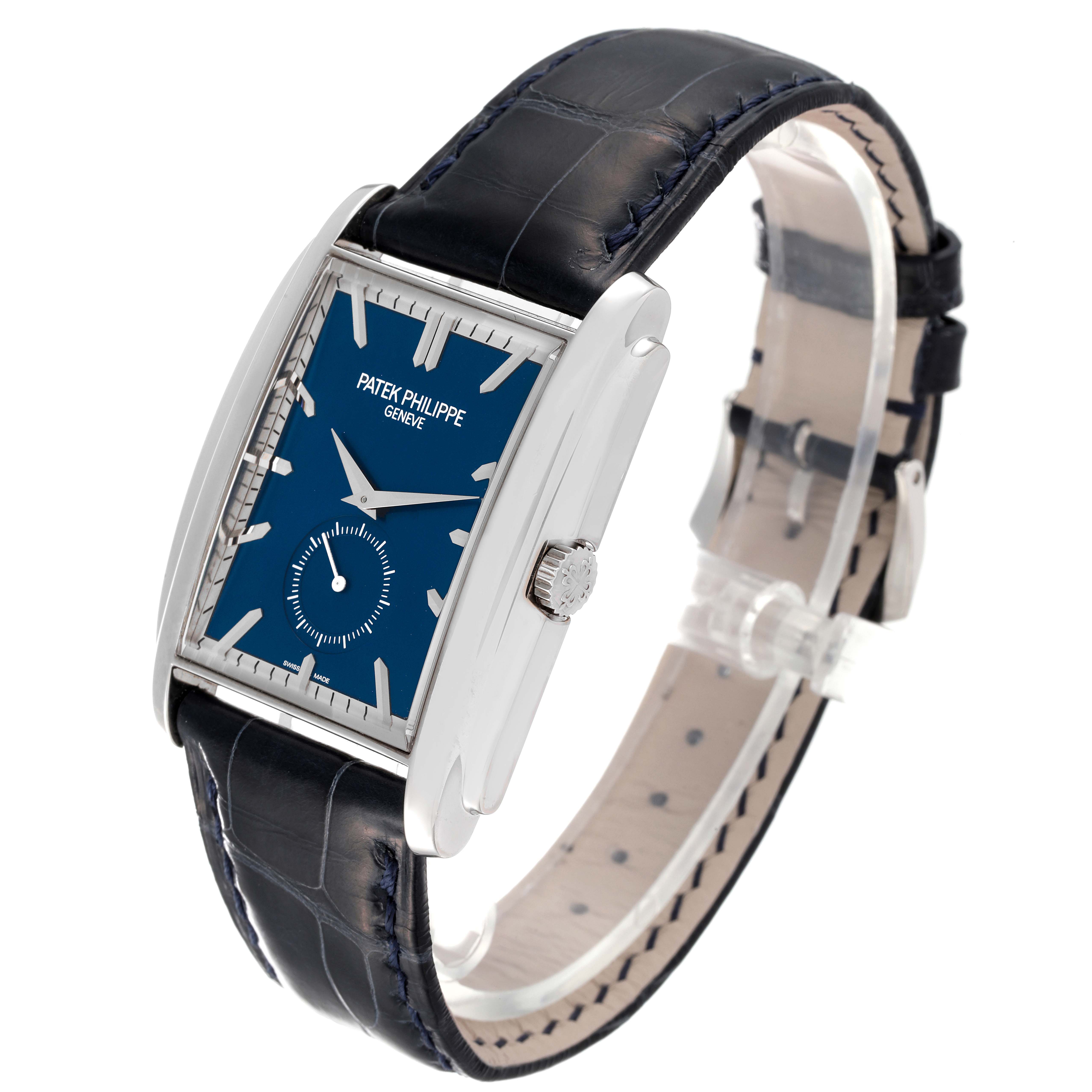 This image shows a Patek Philippe Gondolo 5124G Men's White Gold Blue Dial 5124G Men's White Gold Blue Dial watch at an angle displaying its rectangular face, crown, and leather strap.