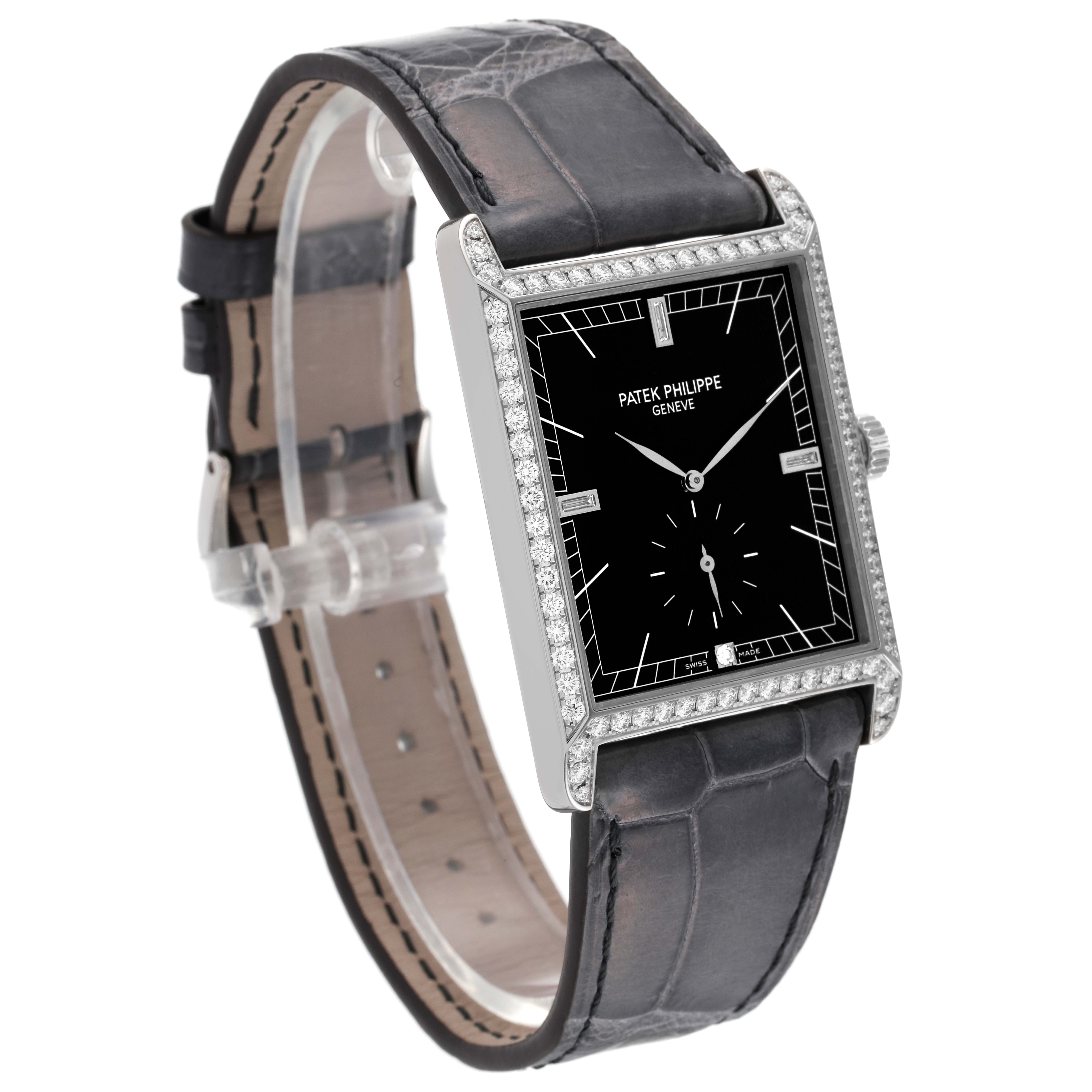 The image shows a Patek Philippe Gondolo 5112G Men's White Gold Black Dial 5112G Men's White Gold Black Dial watch from an angled side view, highlighting the face, bezel, and strap.
