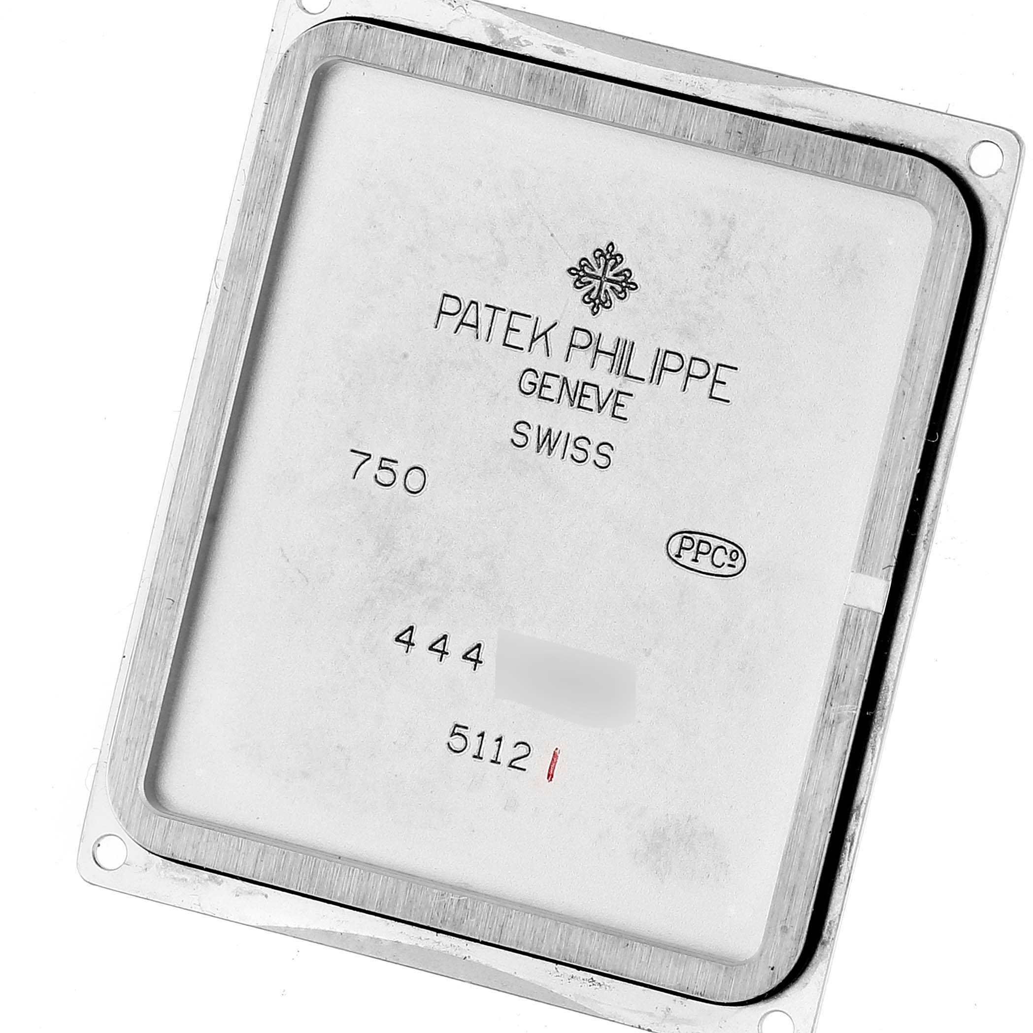 This image shows the back cover of a Patek Philippe Gondolo 5112G Men's White Gold Black Dial 5112G Men's White Gold Black Dial watch, displaying its model and hallmarks.