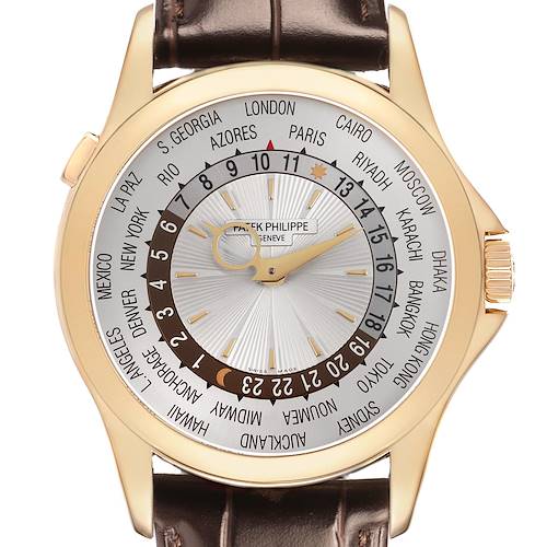 The Patek Philippe Complications 5130J Men's Yellow Gold Silver Dial watch is shown from the front, highlighting its world time dial and brown leather strap.