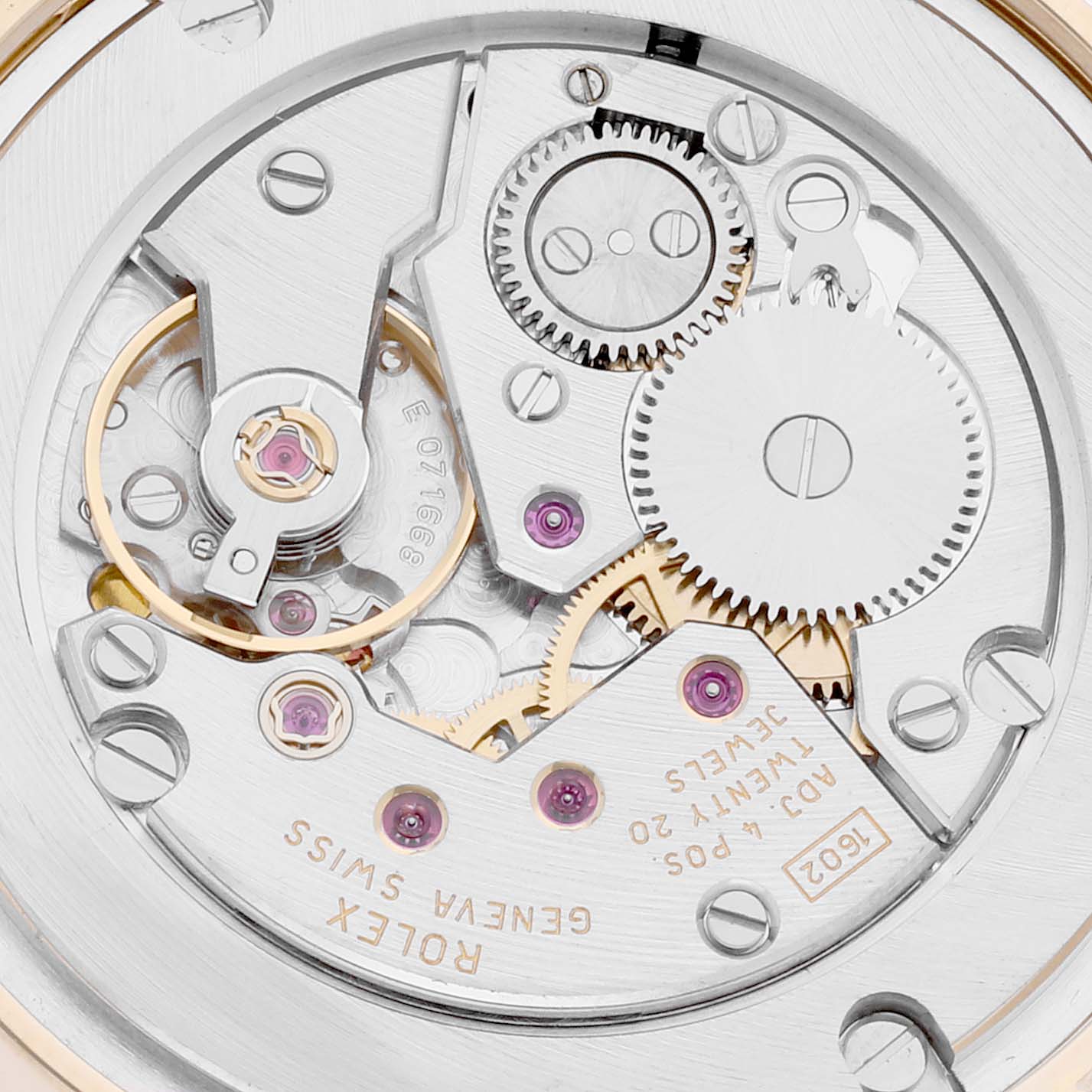 This image shows the intricate inner mechanical parts of a Rolex Cellini 5115 Men's Yellow Gold Mother of Pearl Dial 5115 Men's Yellow Gold Mother of Pearl Dial watch movement from an overhead angle.