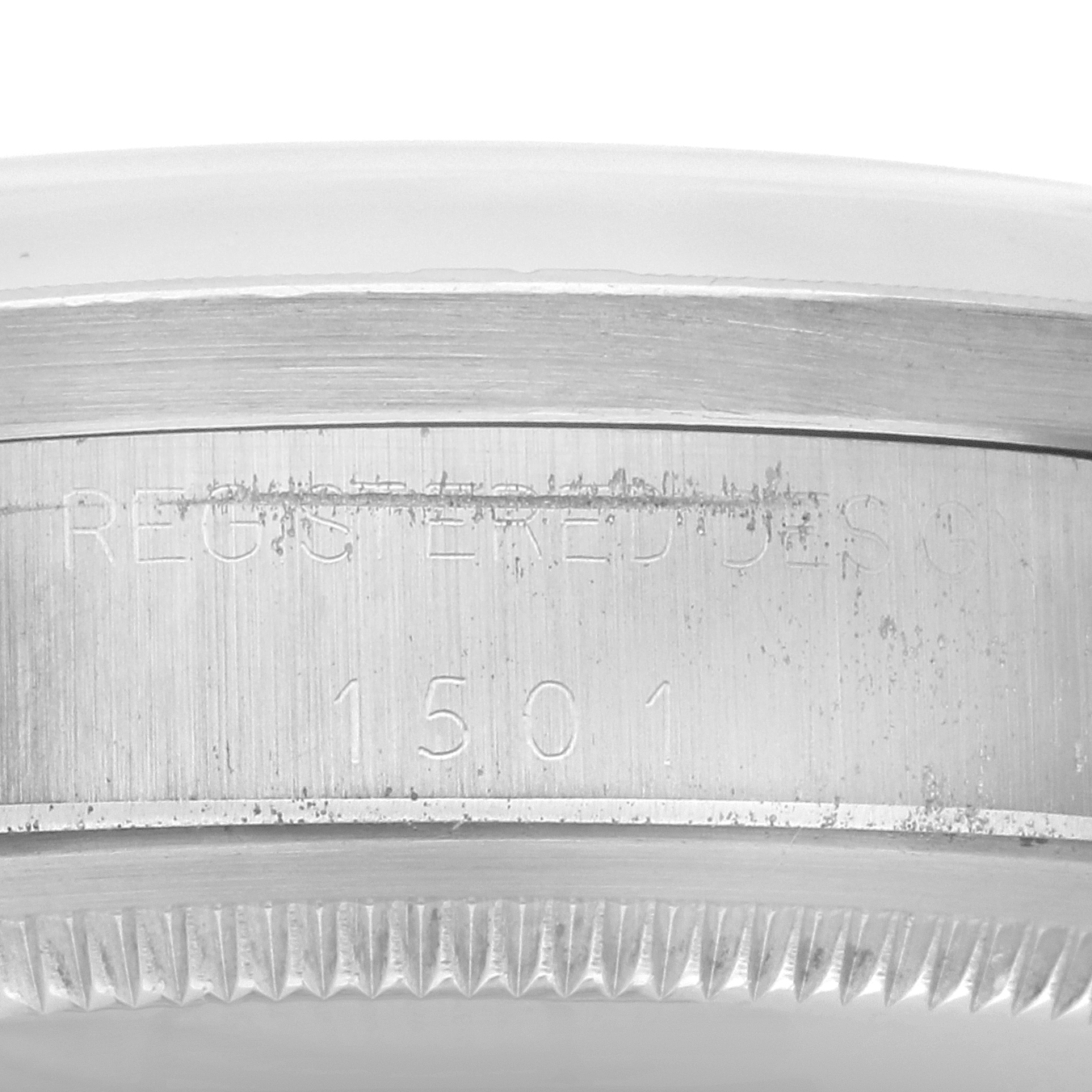 The image shows the side view of the bezel and case edge of a Rolex Date model watch, displaying model number 1501.