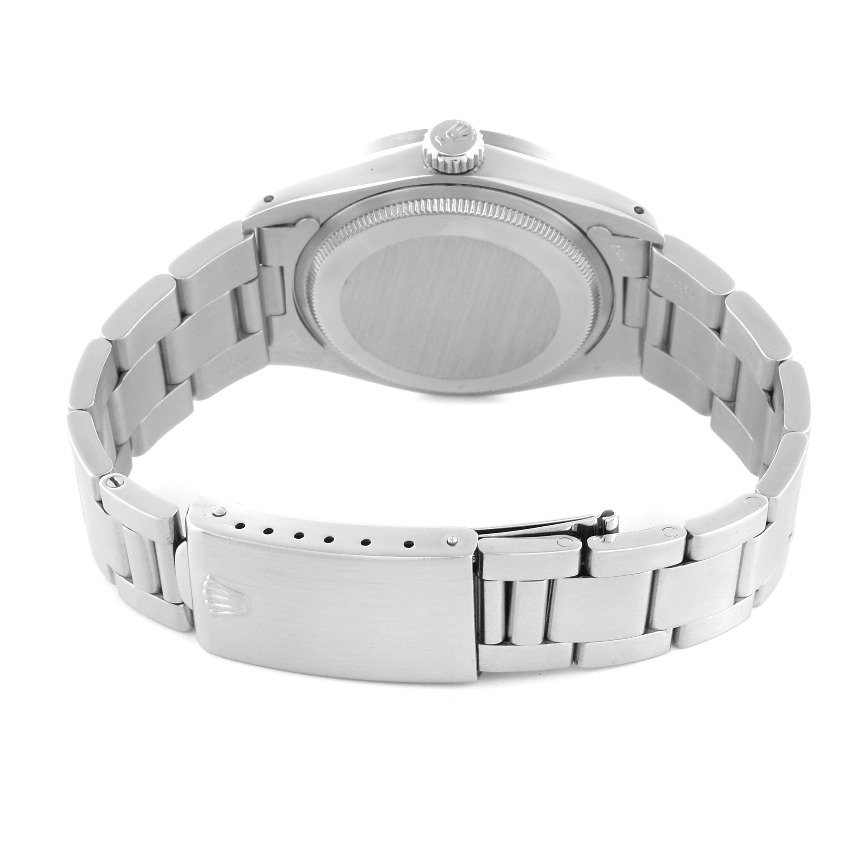 The image shows the back and clasp of a Rolex Date model watch from a rear angle.