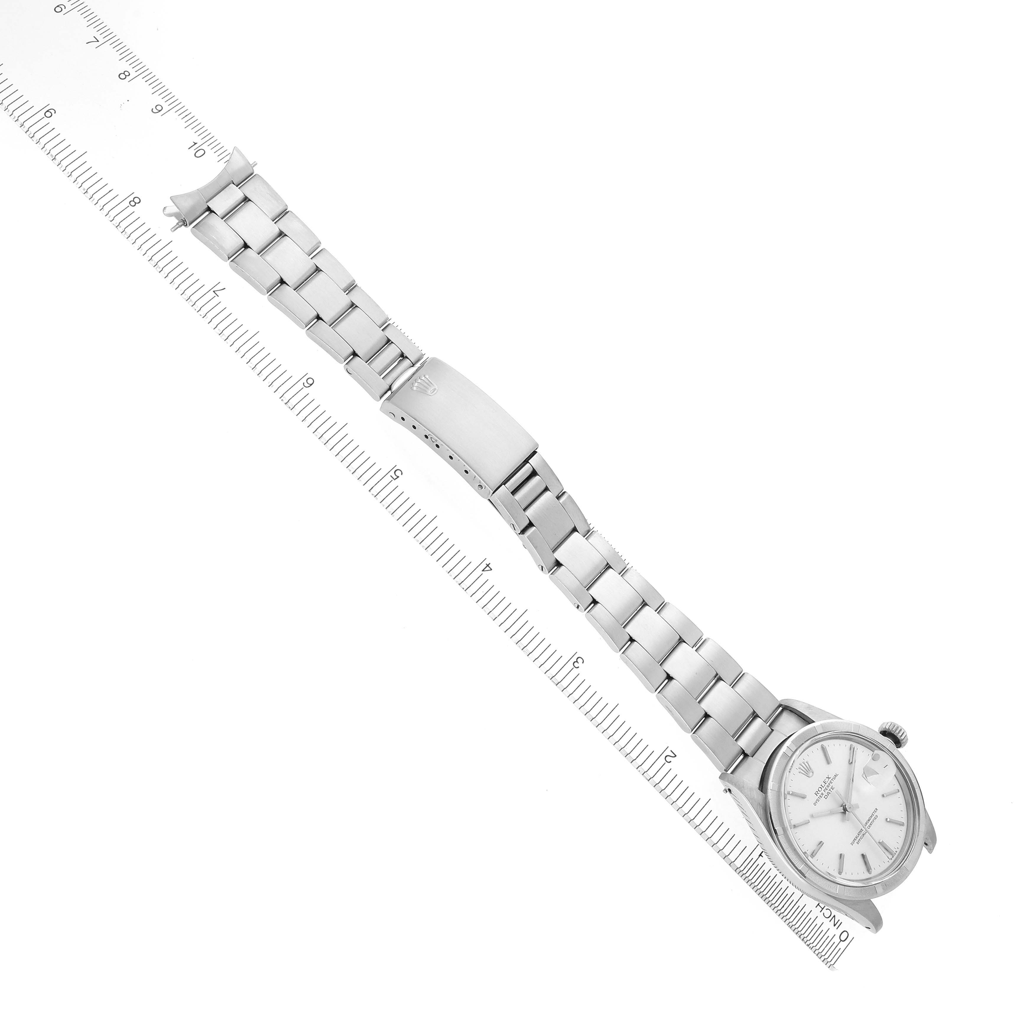 The Rolex Date watch is shown from a top-down angle with its full bracelet and clasp visible.