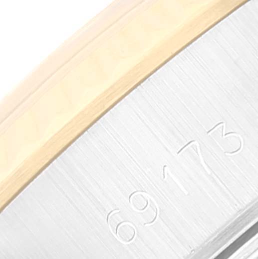 This image shows a close-up of the case side engraving with the model number "69173" on a Rolex Date 69173 Women's Steel and Gold (two tone) Silver Dial 69173 Women's Steel and Gold (two tone) Silver Dial watch.
