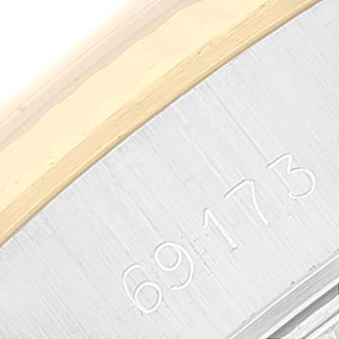 This image shows a close-up of the side of a Rolex Datejust 69173 Women's Steel and Gold (two tone) Champagne Dial 69173 Women's Steel and Gold (two tone) Champagne Dial watch case, featuring the model number 69173.