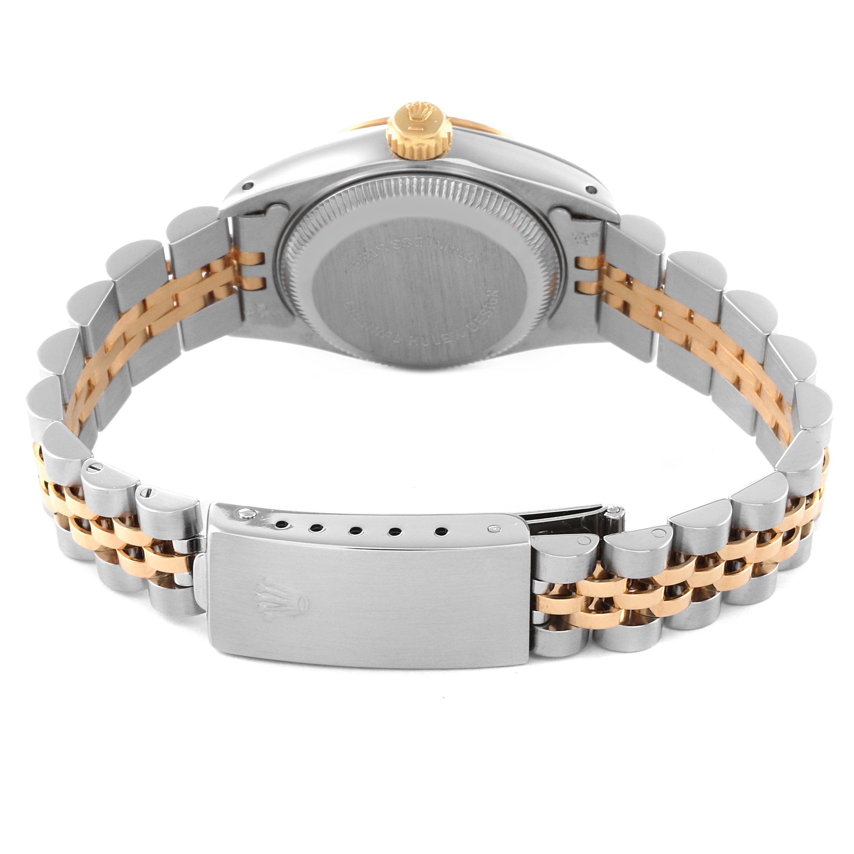 The image shows the back view of a Rolex Datejust 69173 Women's Steel and Gold (two tone) Champagne Dial 69173 Women's Steel and Gold (two tone) Champagne Dial watch, highlighting the case back, screw-down crown, and the two-tone Jubilee bracelet with clasp.