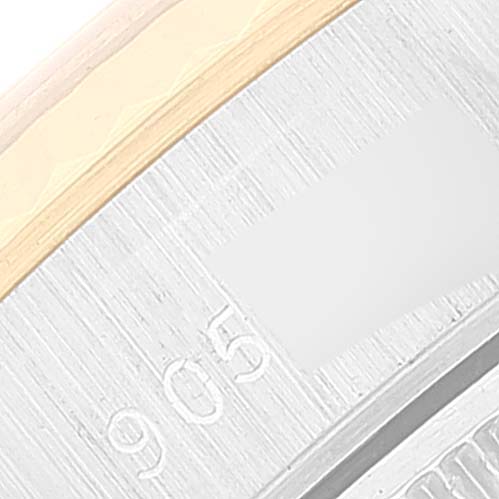 This close-up image shows the side view of the bezel and some markings on the Rolex Datejust 69173 Women's Steel and Gold (two tone) Champagne Dial 69173 Women's Steel and Gold (two tone) Champagne Dial watch.