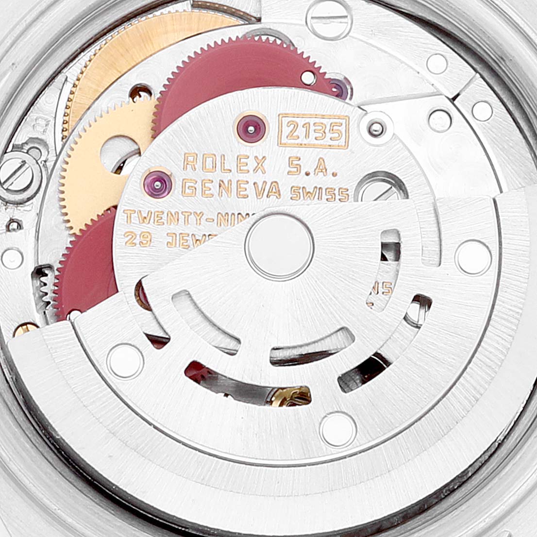 The image shows the movement mechanism of a Rolex Datejust 69173 Women's Steel and Gold (two tone) Champagne Dial 69173 Women's Steel and Gold (two tone) Champagne Dial, highlighting gears and the oscillating weight.