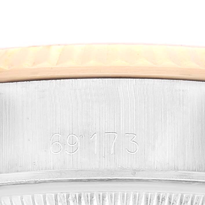 The image shows a close-up view of the side of a Rolex Datejust 69173 Women's Steel and Gold (two tone) Champagne Dial 69173 Women's Steel and Gold (two tone) Champagne Dial watch, highlighting the model number 69173.