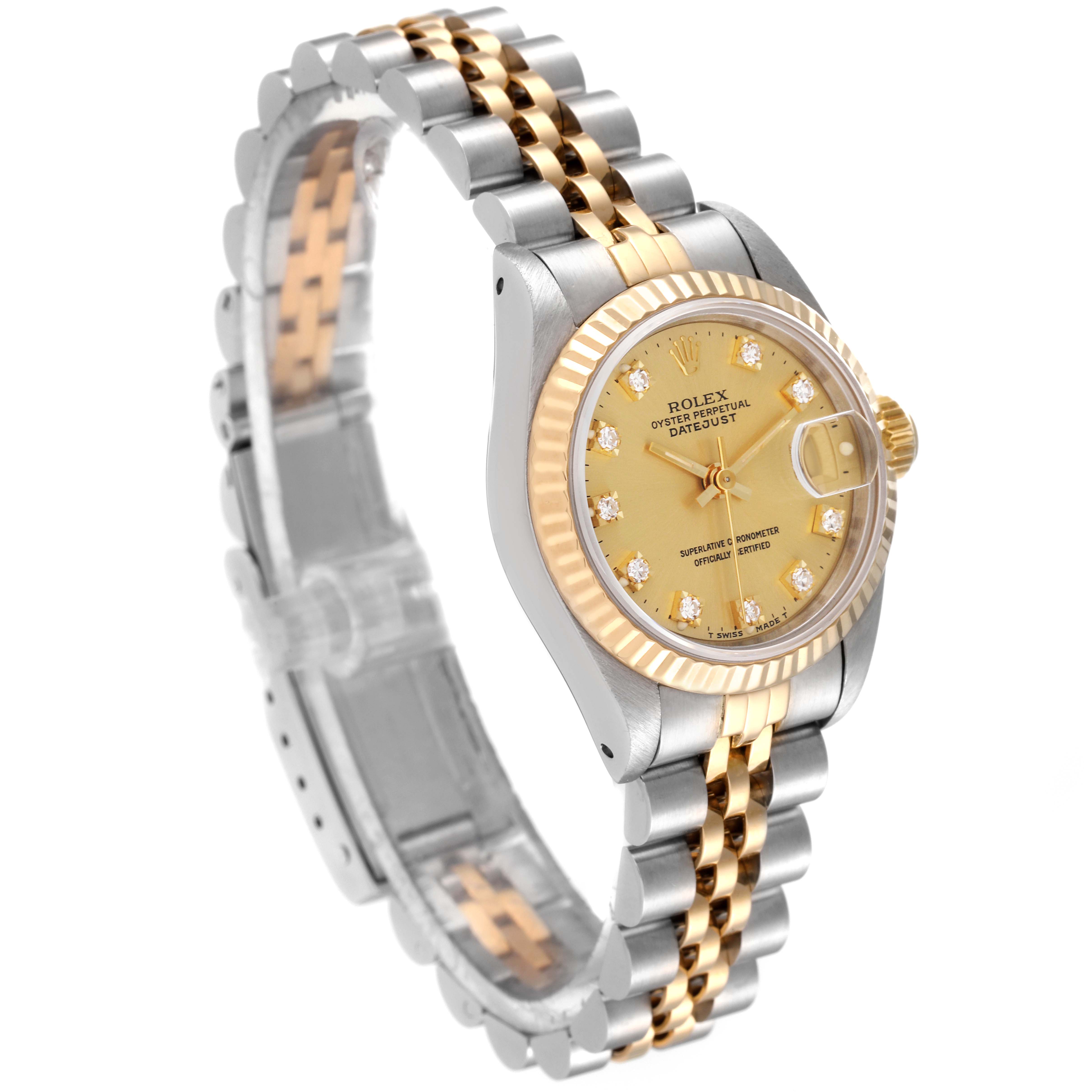The image showcases a Rolex Datejust 69173 Women's Steel and Gold (two tone) Champagne Dial 69173 Women's Steel and Gold (two tone) Champagne Dial watch with a gold dial and a two-tone Jubilee bracelet, taken from an angled side view.
