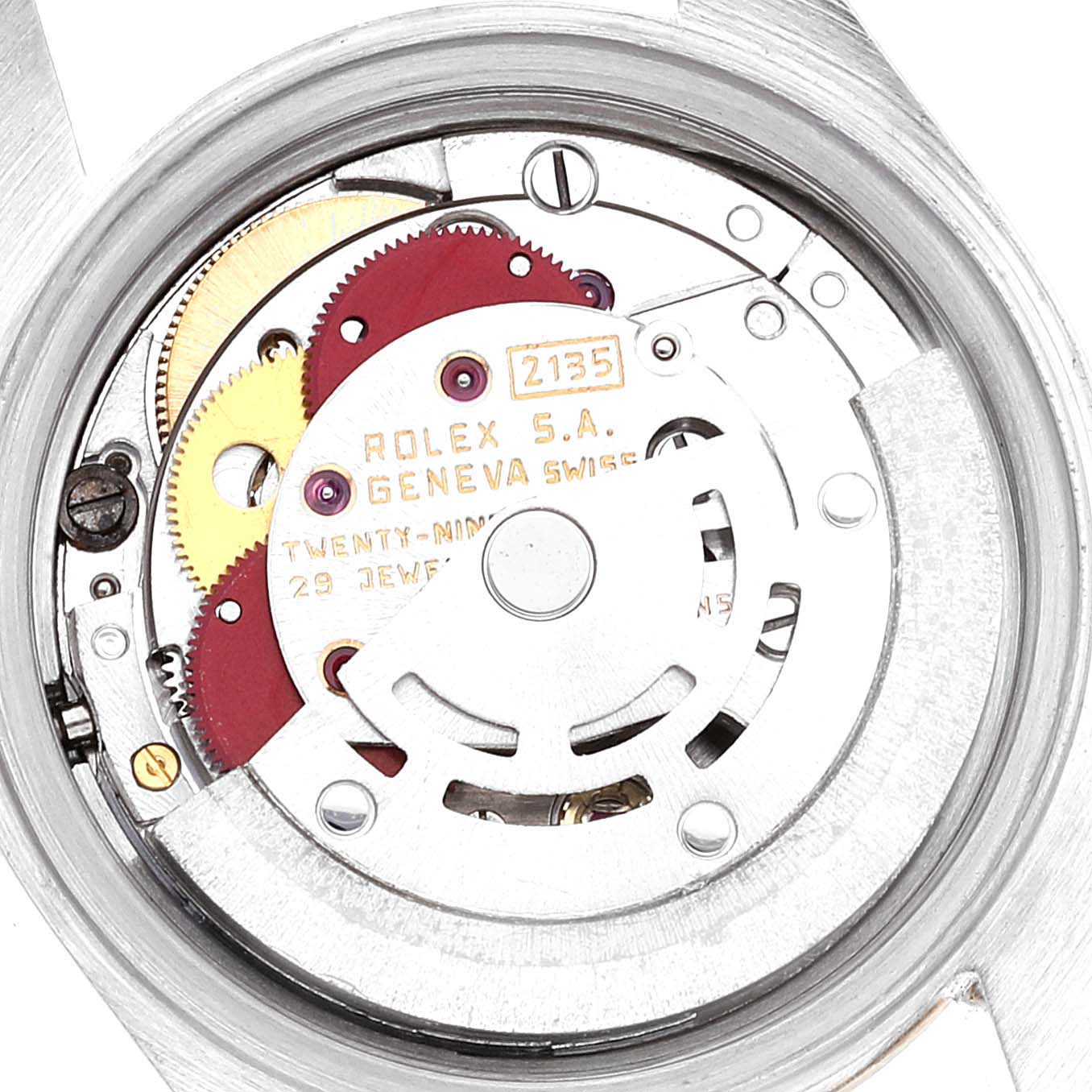 This image shows a close-up of the movement mechanism inside a Rolex Datejust 69173 Women's Steel and Gold (two tone) White Dial 69173 Women's Steel and Gold (two tone) White Dial model watch, highlighting gears and internal components.