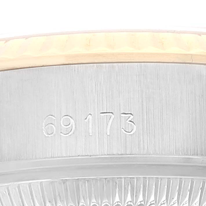 This is a close-up image showing the model number on the side of the casing of a Rolex Datejust 69173 Women's Steel and Gold (two tone) White Dial 69173 Women's Steel and Gold (two tone) White Dial watch.