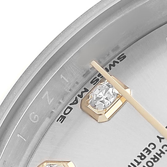 The image shows a close-up of the Rolex Datejust 279163 Women's Steel and Gold (two tone) Silver Dial dial, focusing on diamond markers and the "Swiss Made" text.