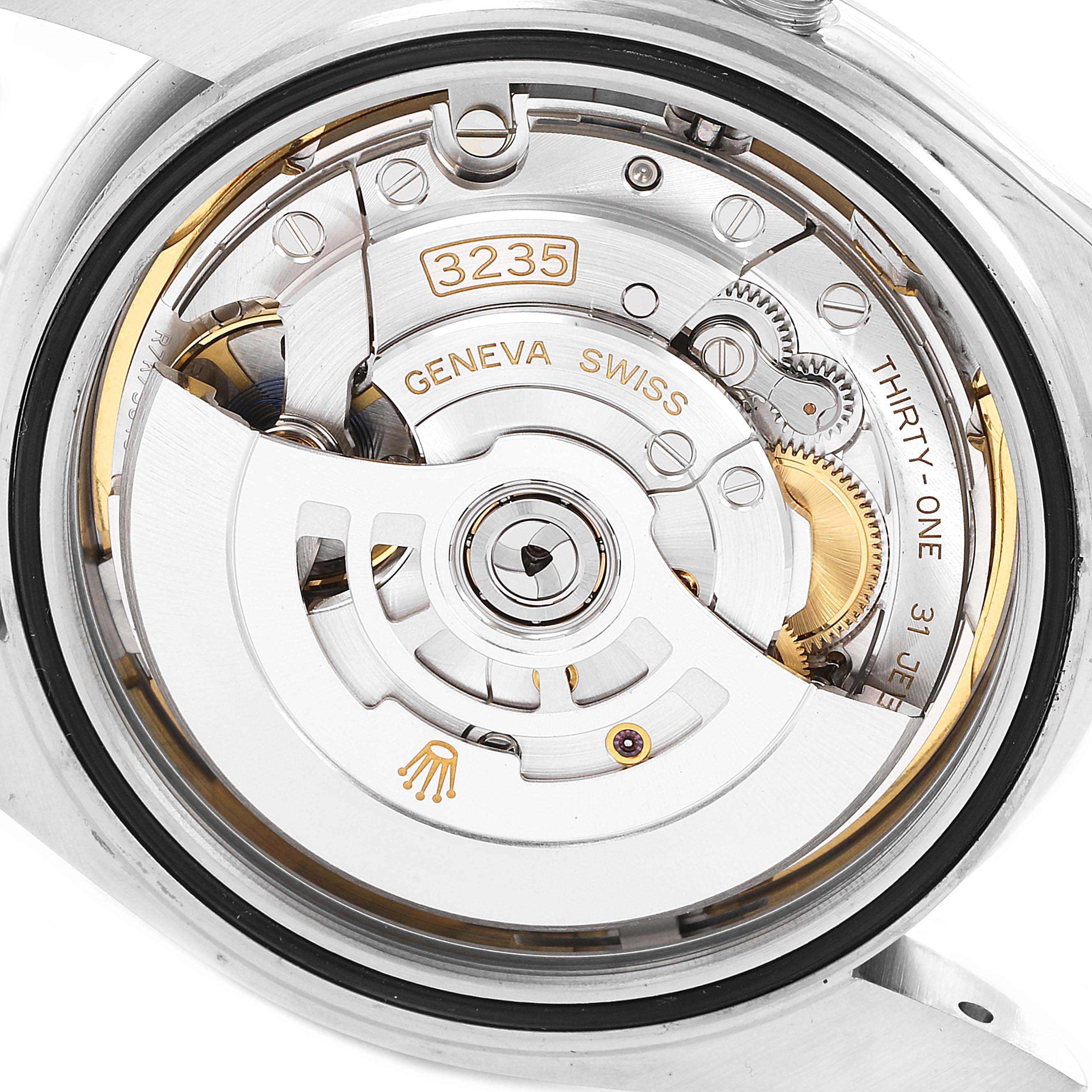 This image shows an interior view of the Rolex Datejust 41 126300 Men's Stainless Steel Blue Dial 126300 Men's Stainless Steel Blue Dial's automatic movement mechanism from the back side.