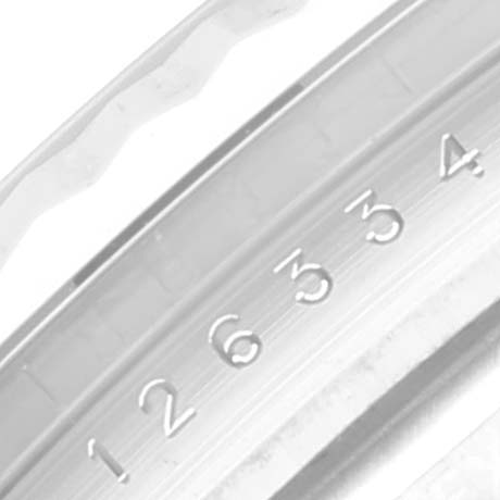 This close-up image of the Rolex Datejust 41 126334 Men's Stainless Steel White Dial 126334 Men's Stainless Steel White Dial shows its bezel with engraved numbers.
