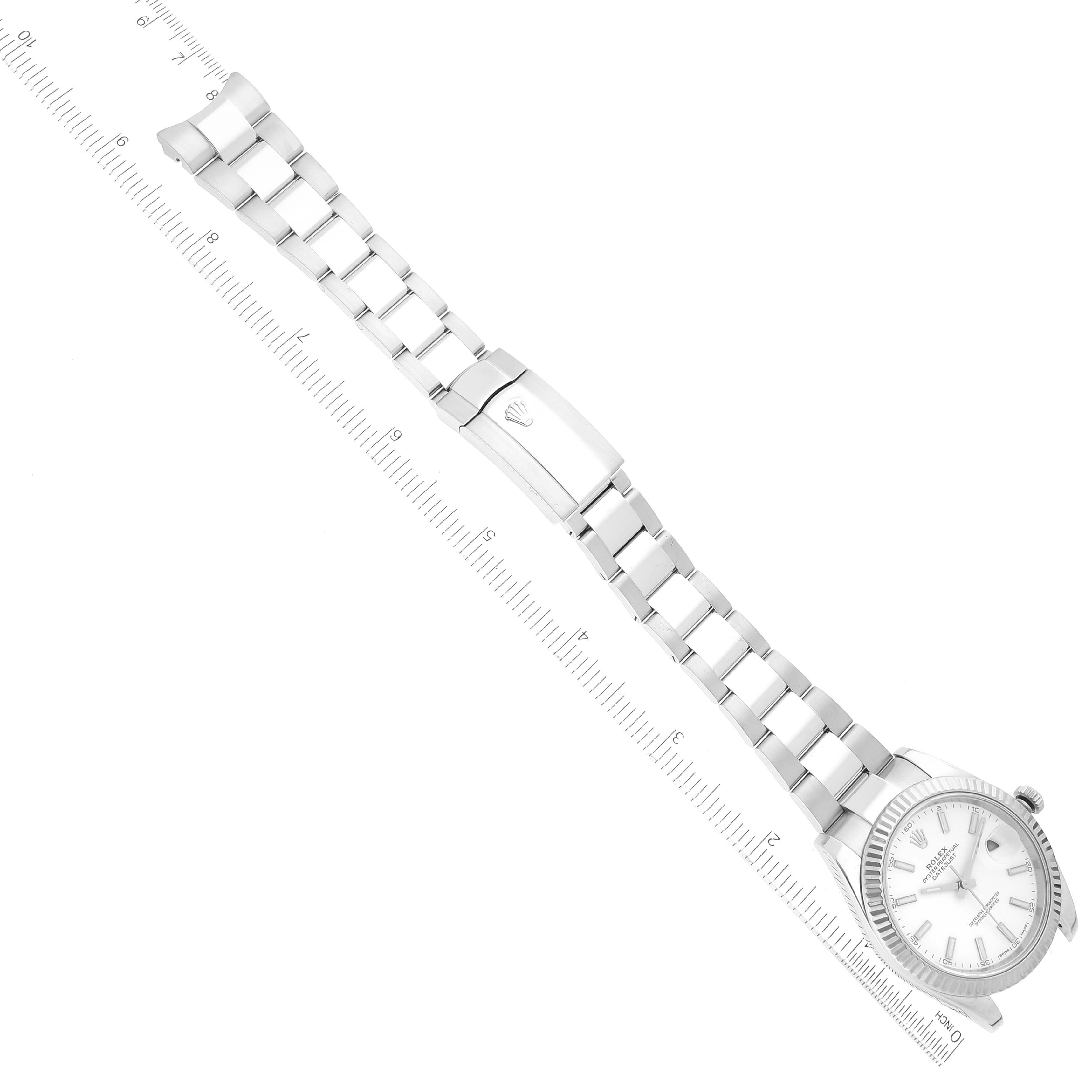 The image shows a top-down view of a Rolex Datejust 41 126334 Men's Stainless Steel White Dial 126334 Men's Stainless Steel White Dial watch with its full bracelet and a clasp bearing the Rolex logo.