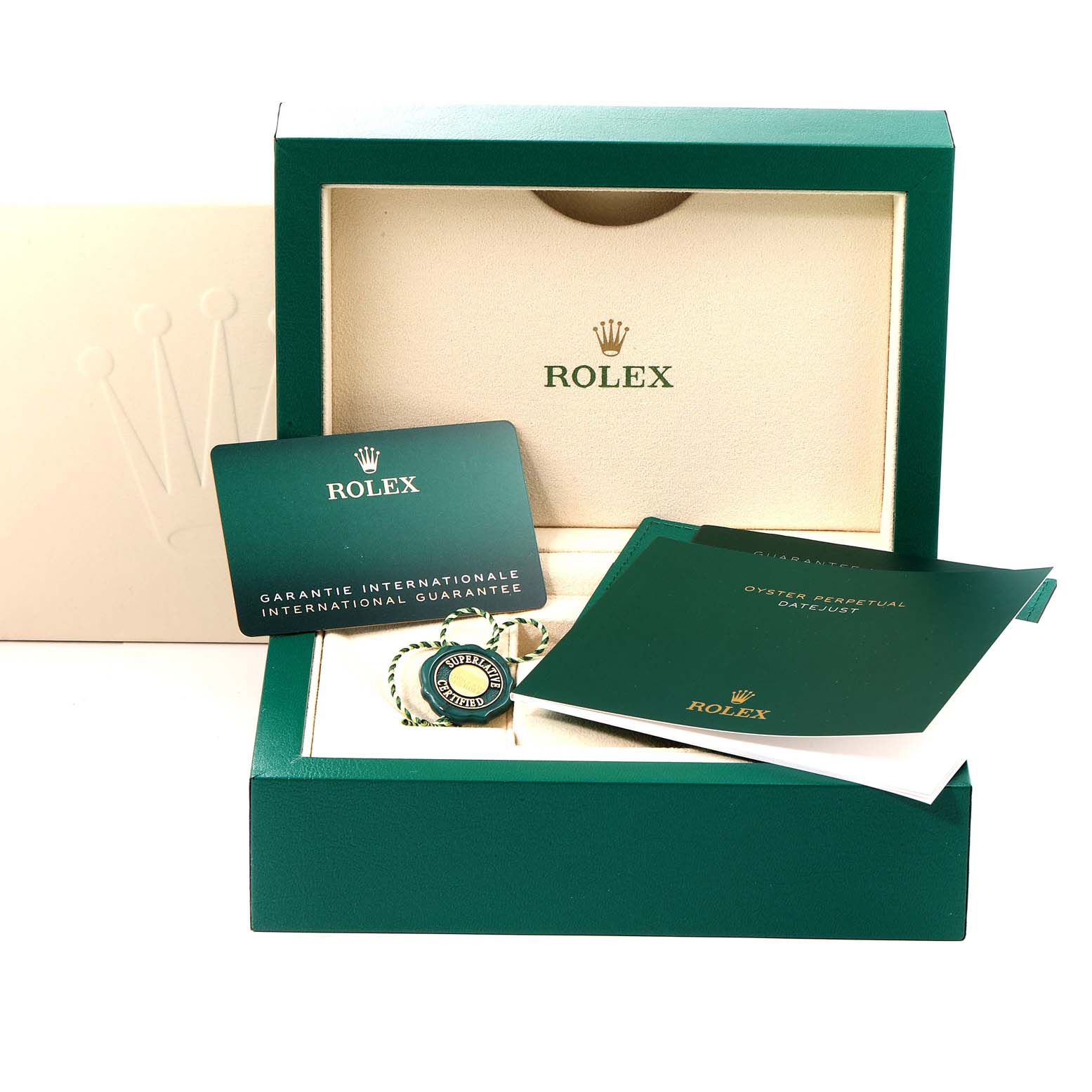 The image shows a Rolex Datejust 41 126334 Men
s Stainless Steel Blue Dial 126334 Men
s Stainless Steel Blue Dial packaging with international guarantee cards and booklets, viewed from the front.