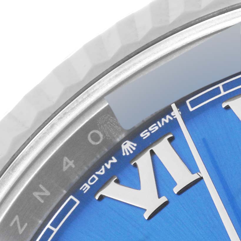 This close-up image shows part of the dial and chapter ring of a Rolex Datejust 41 126334 Men's Stainless Steel Blue Dial 126334 Men's Stainless Steel Blue Dial watch.