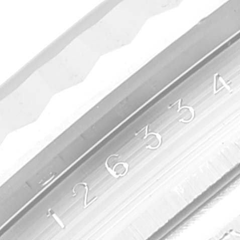 This close-up image shows the engraved numbers and part of the fluted bezel of the Rolex Datejust 41 126334 Men's Stainless Steel Blue Dial 126334 Men's Stainless Steel Blue Dial model.