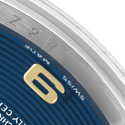 This close-up image of a Rolex Datejust 179163 Women's Steel and Gold (two tone) Blue Dial shows part of the dial with the number "6" and "Swiss Made" text.