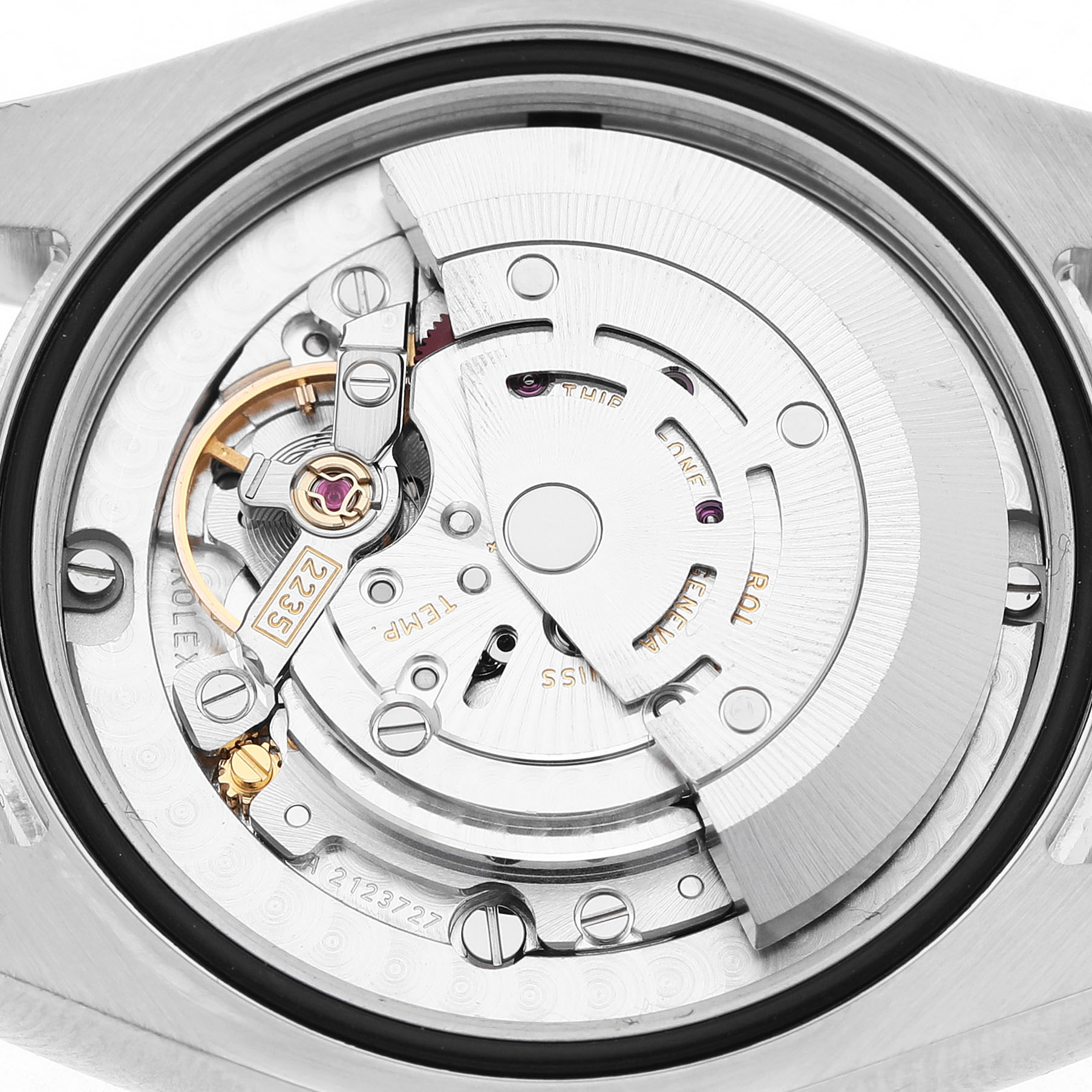 The image shows the movement of a Rolex Datejust 178240 Women's Stainless Steel Pink Dial watch from a back view, highlighting its intricate internal mechanism.