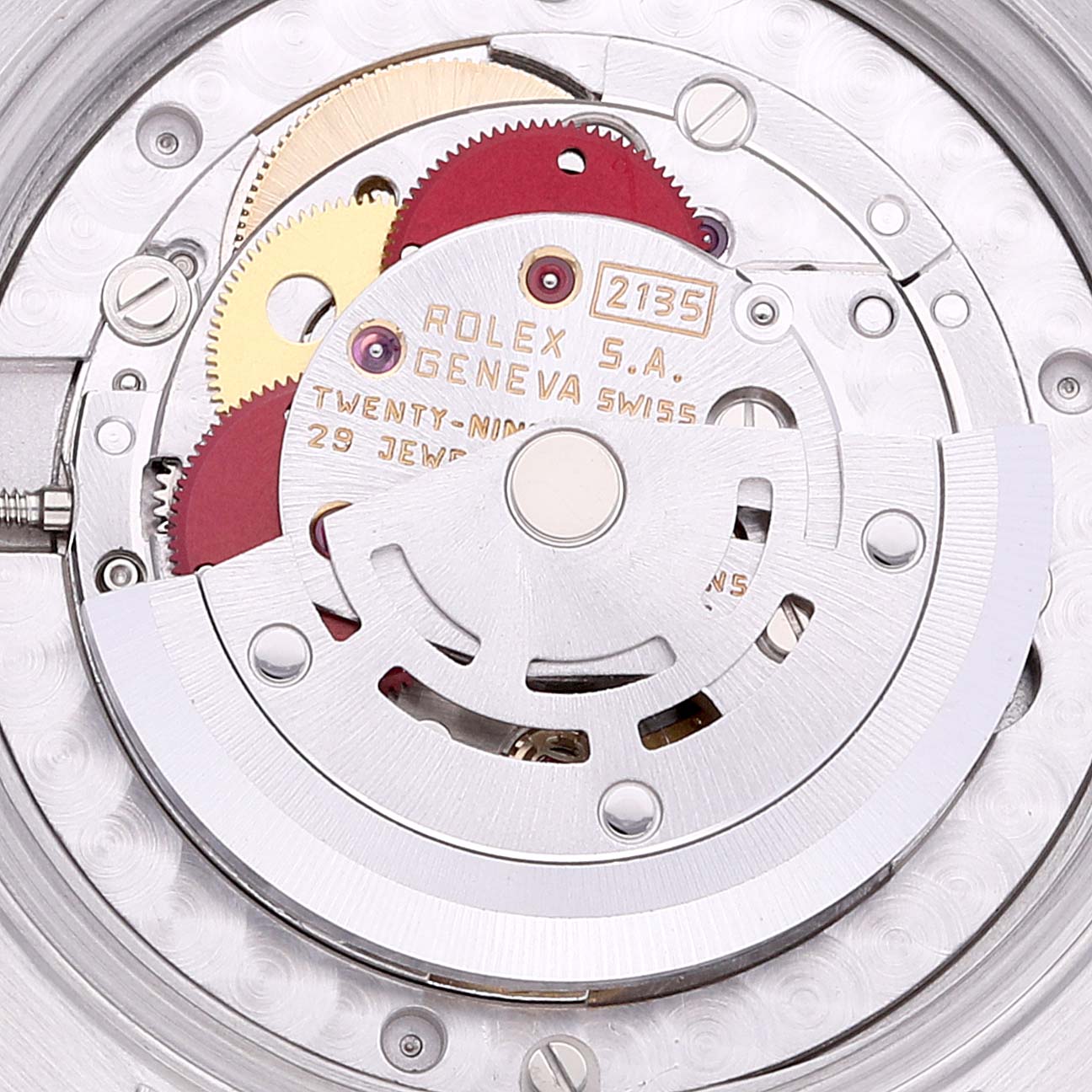 This is the internal mechanism of a Mid-Size Rolex watch, viewed from the back showing the movement components.
