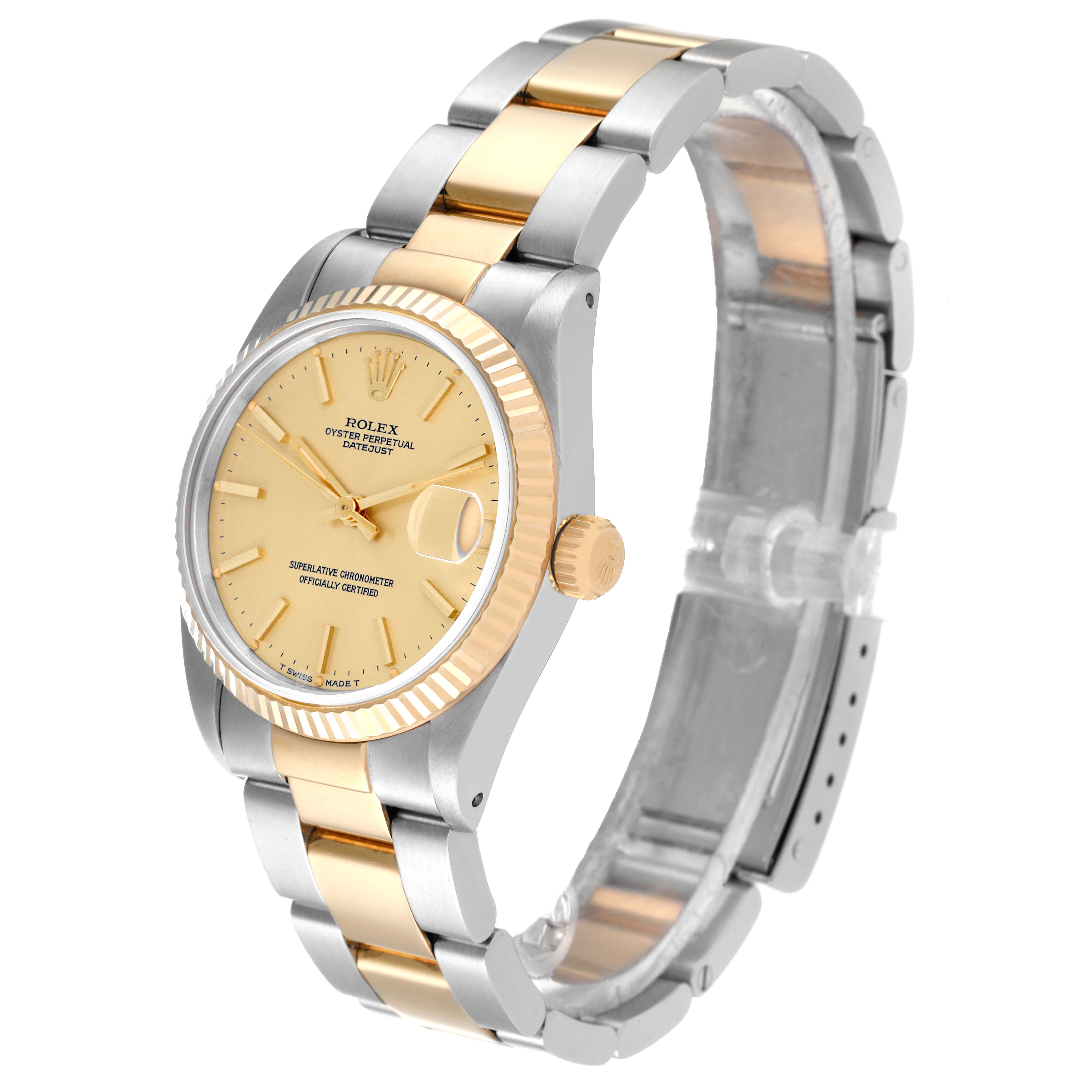 The image shows a side and angled view of the Rolex Mid-Size 68273 Women
s Steel and Gold (two tone) Champagne Dial 68273 Women
s Steel and Gold (two tone) Champagne Dial model watch, displaying its face, bezel, crown, and bracelet.