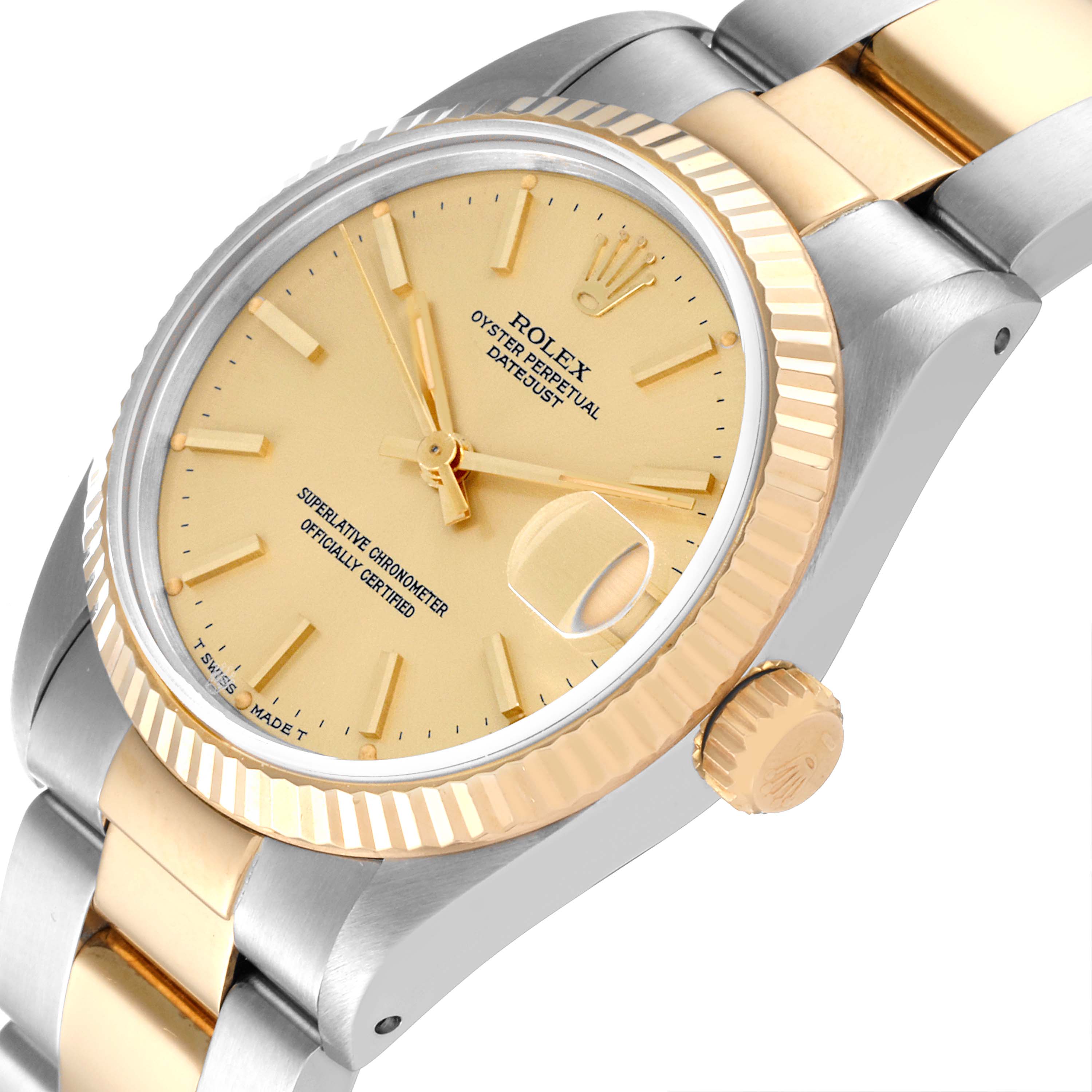 The image shows a Rolex Mid-Size 68273 Women
s Steel and Gold (two tone) Champagne Dial 68273 Women
s Steel and Gold (two tone) Champagne Dial model watch from an angled side view highlighting the dial, bezel, and part of the bracelet.